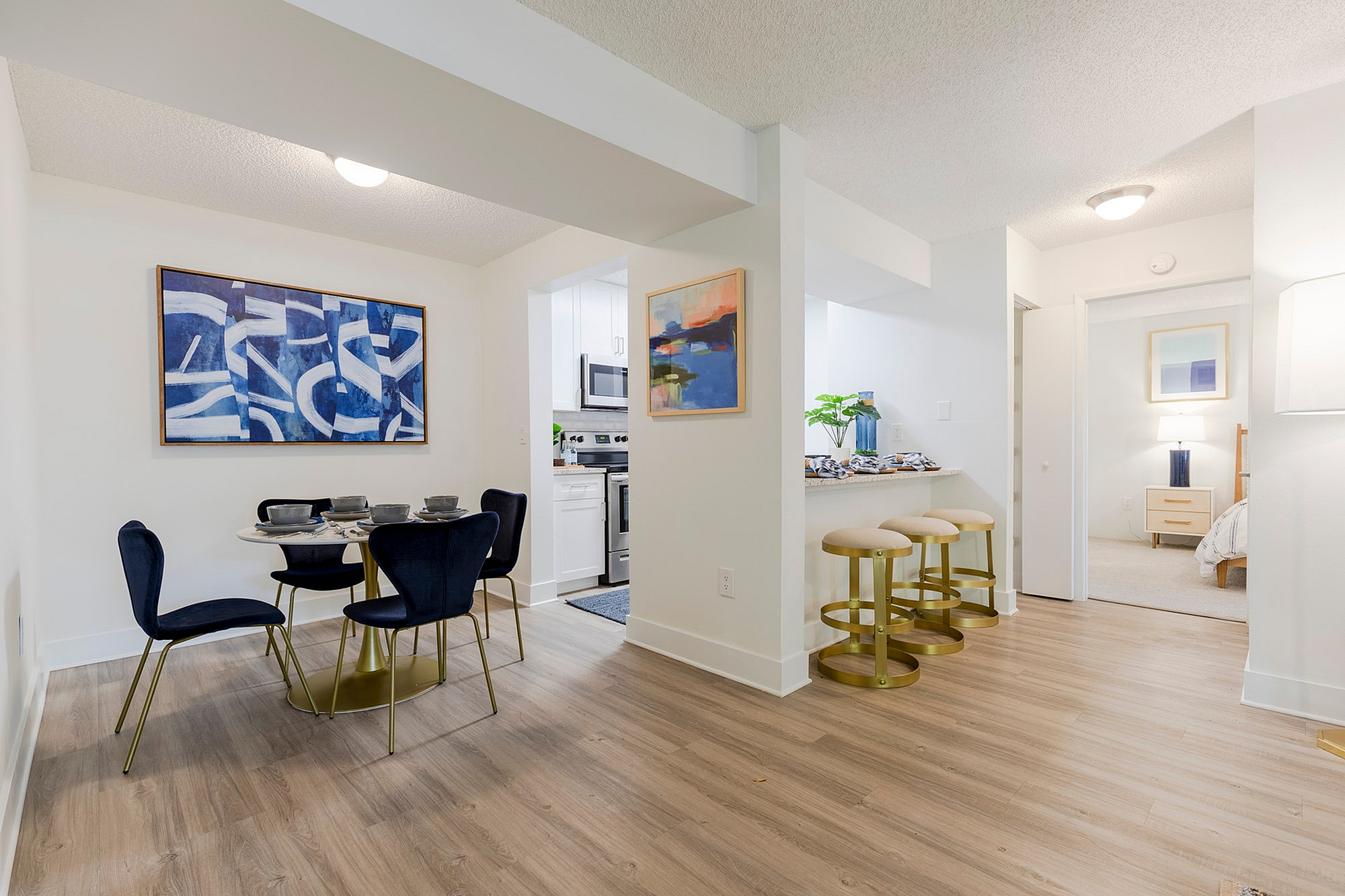 Dining room and kitchen with table and chairs