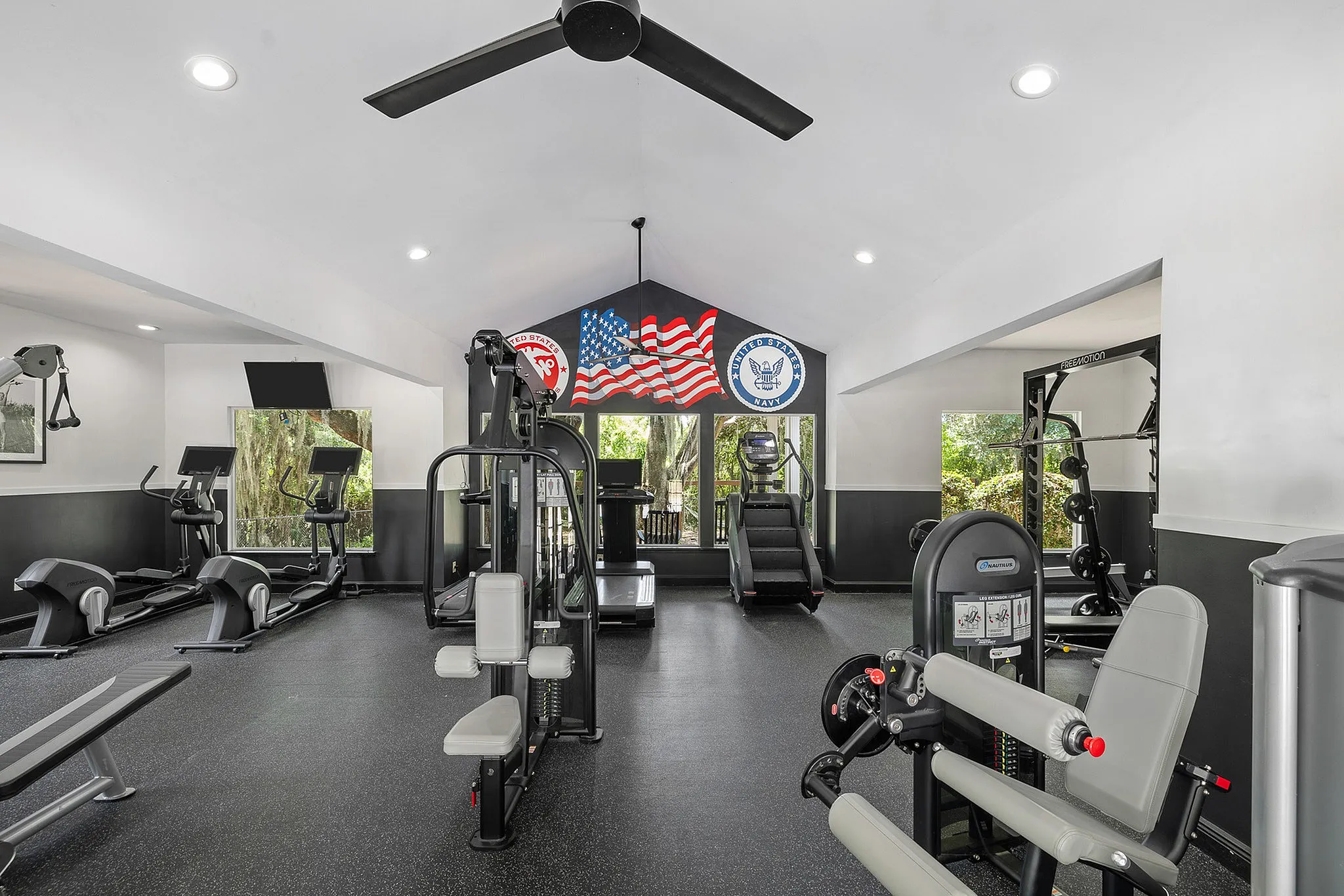 Fitness center with cardio equipment, machines and free weights