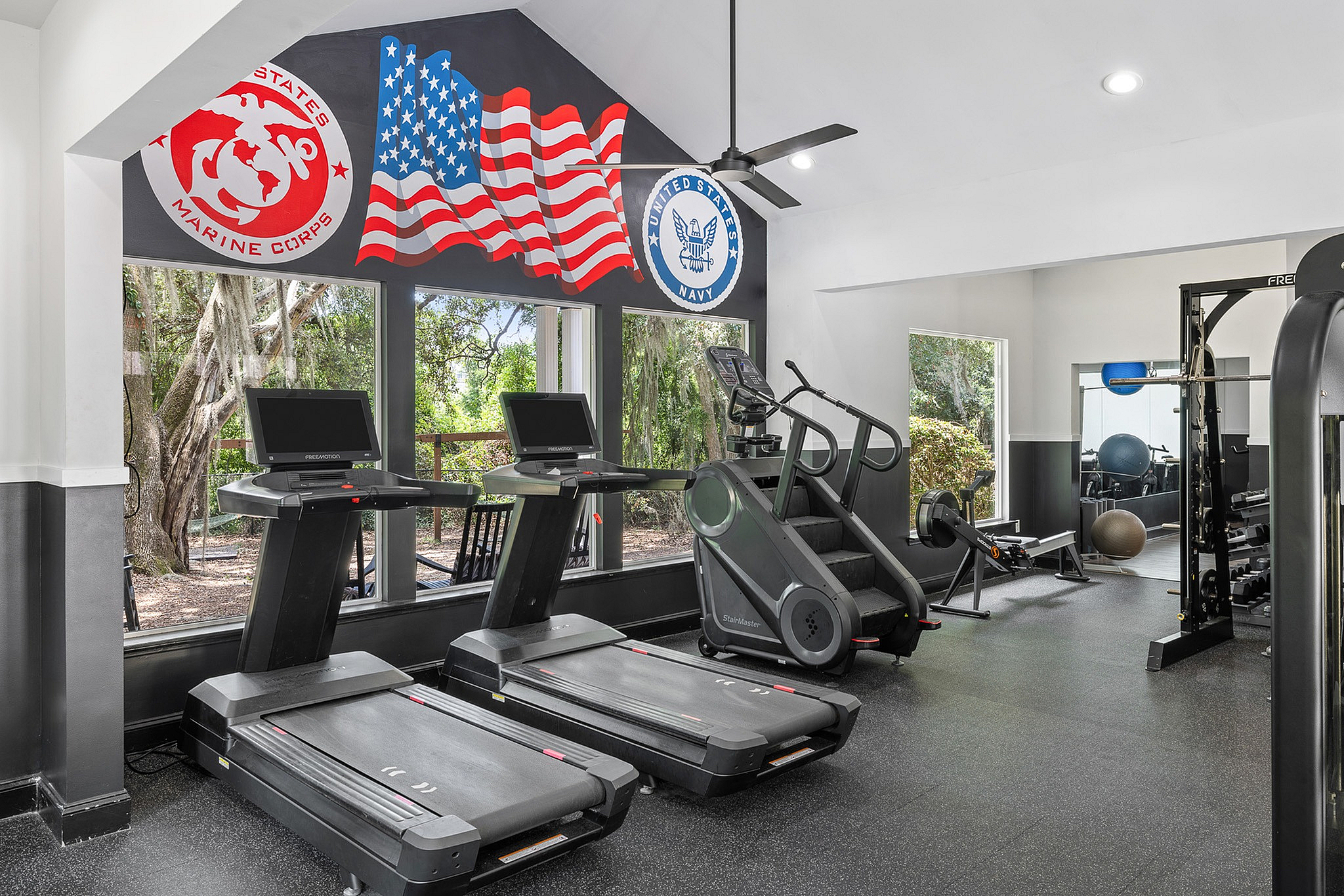 Fitness center with cardio equipment, machines and free weights