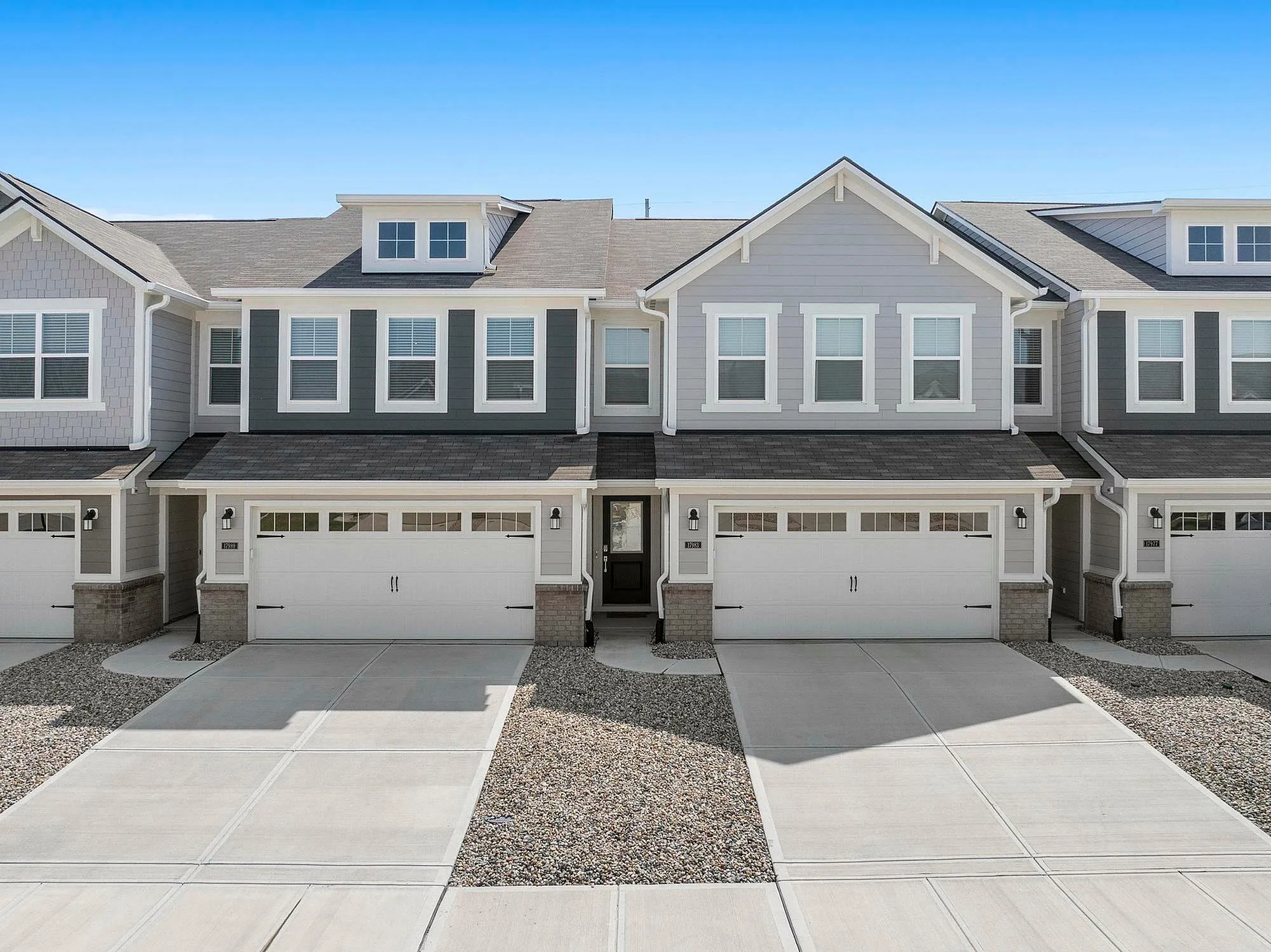 Dog-Friendly Townhomes in Westfield, IN - Casey Corner Townhomes - Attached 2-Car Parking with Smart Home Features.