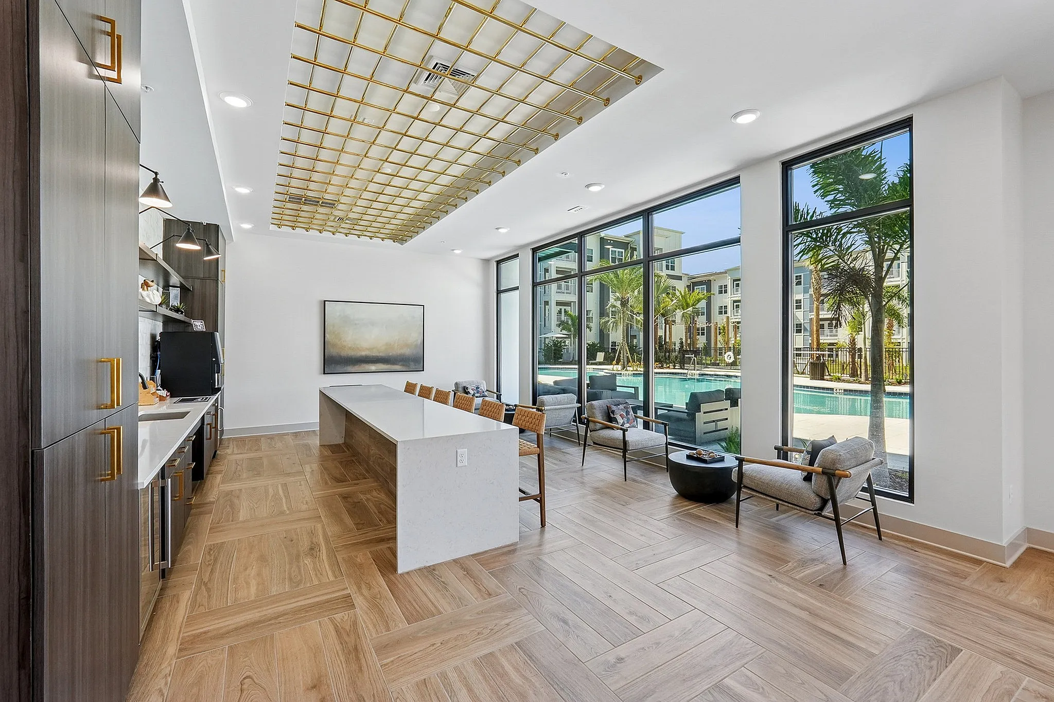 Clubroom with seating and view of pool