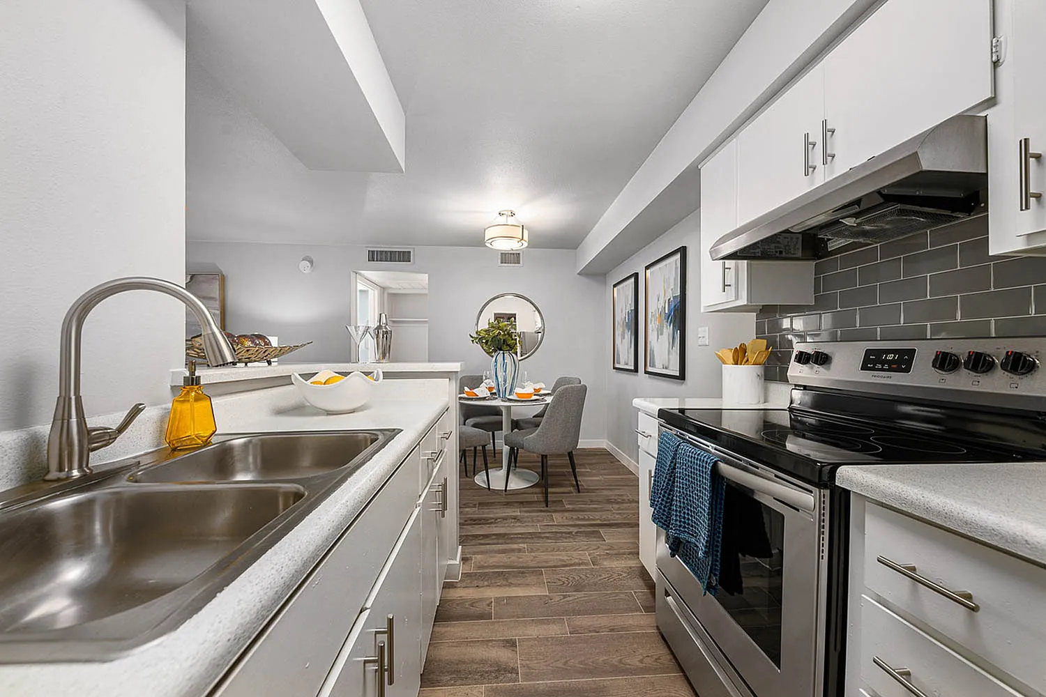 upscale kitchen with tile backsplash