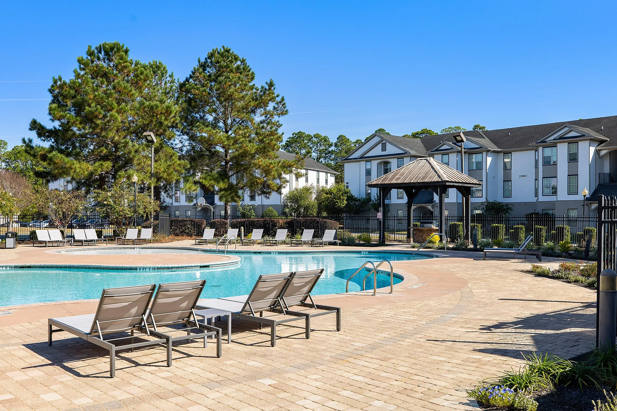 Sparkling swimming pool with gazebo