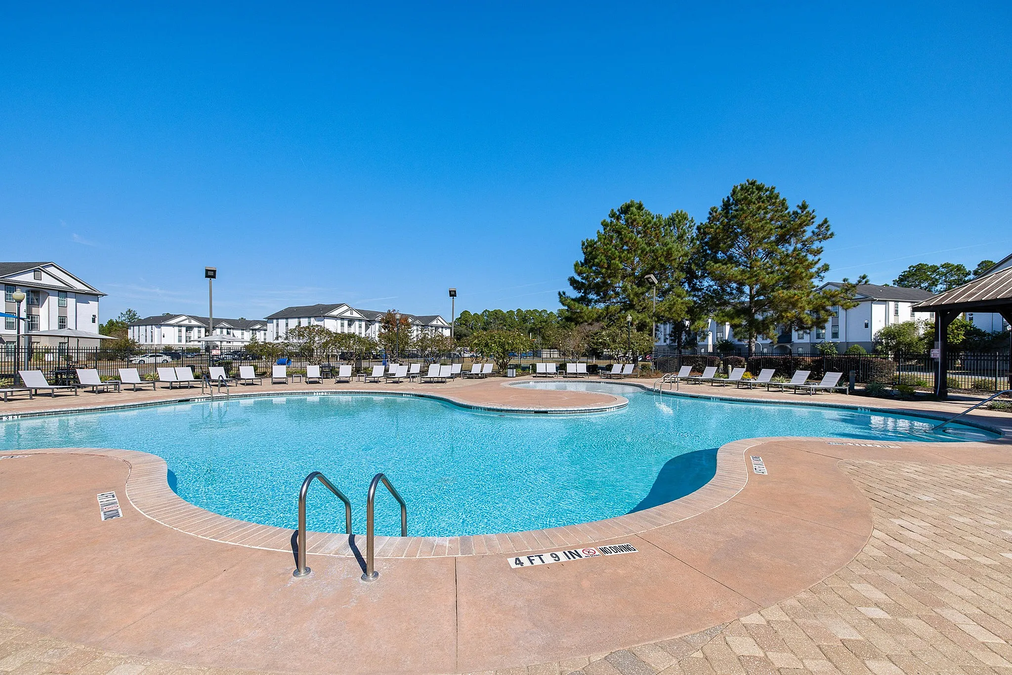 Sparkling swimming pool with gazebo