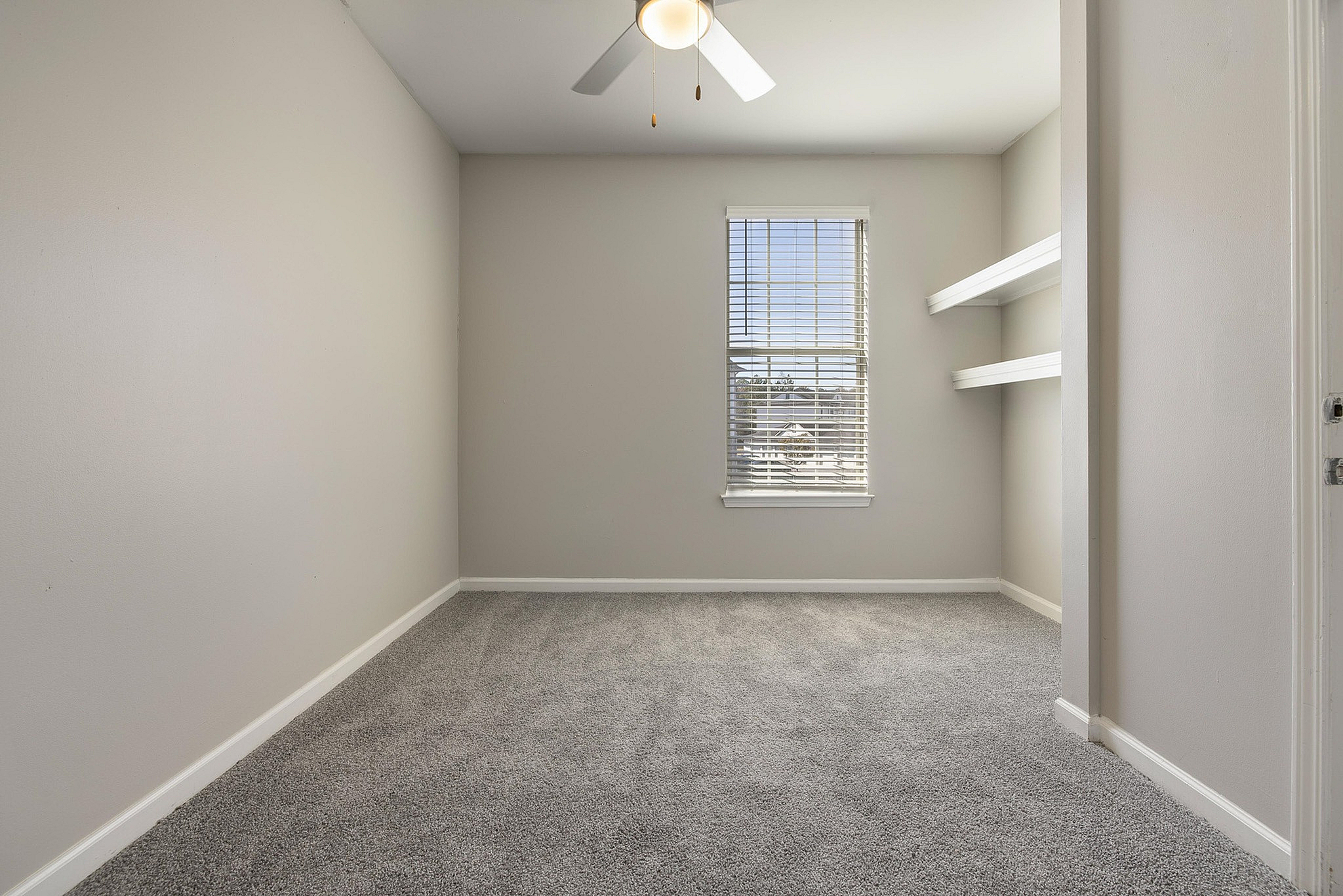 Carpeted bedroom