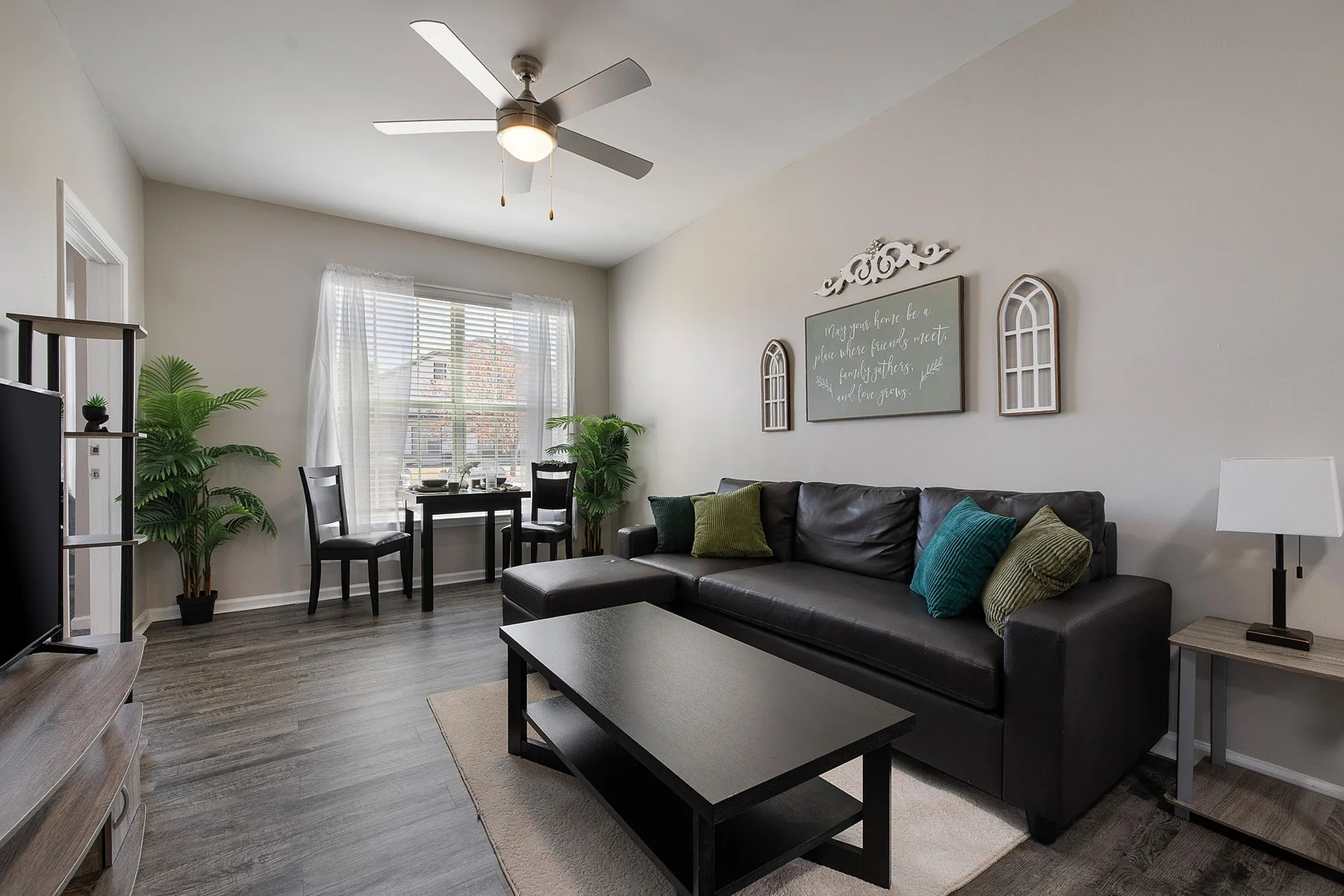 Model living room with black couch