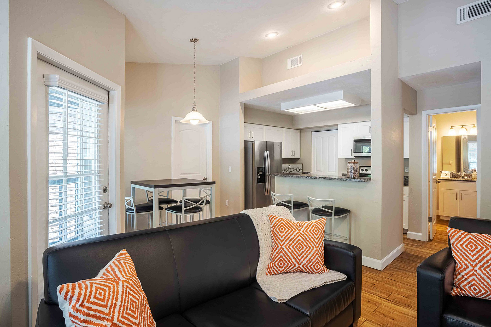 model home with black couch