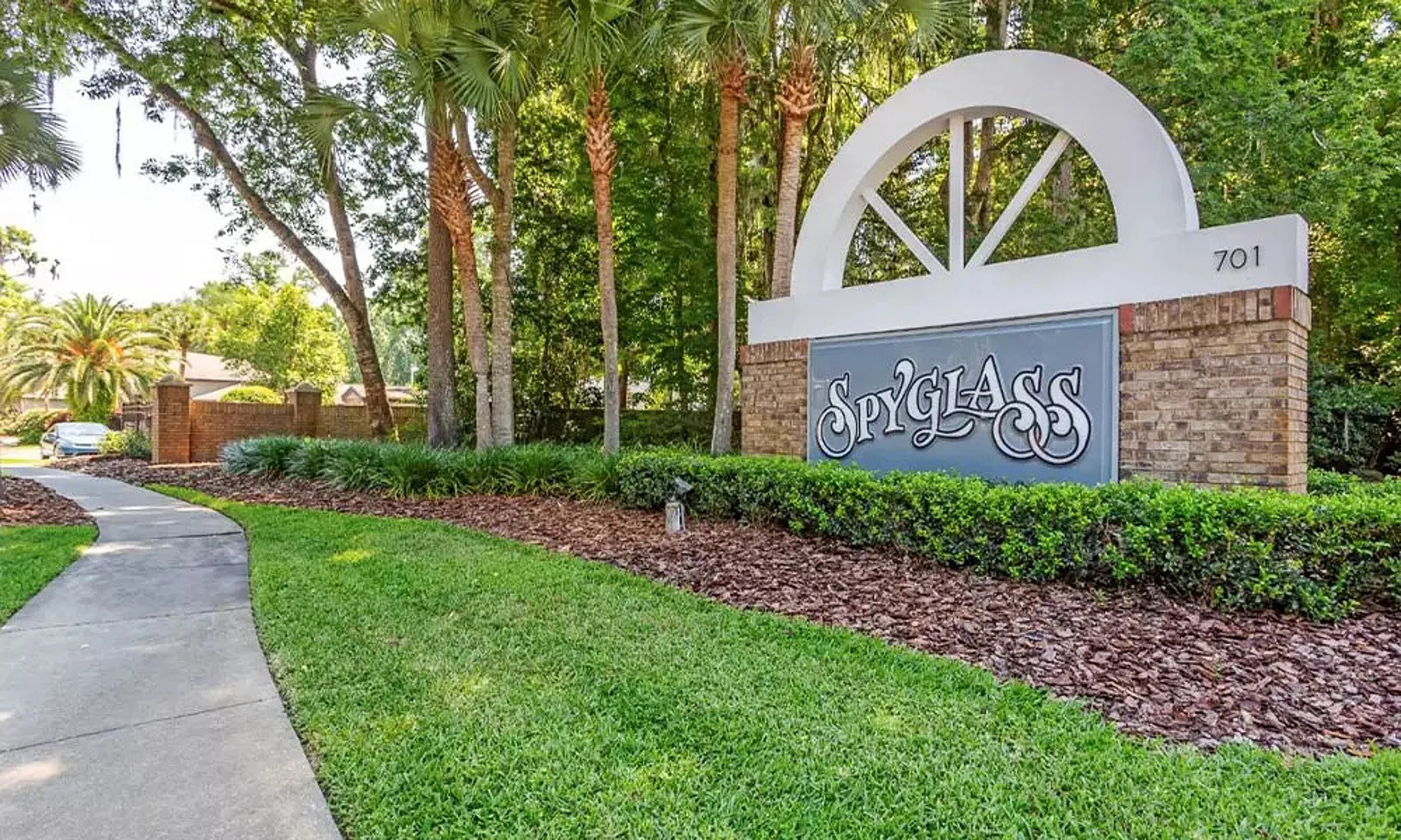entrance with monument sign of community