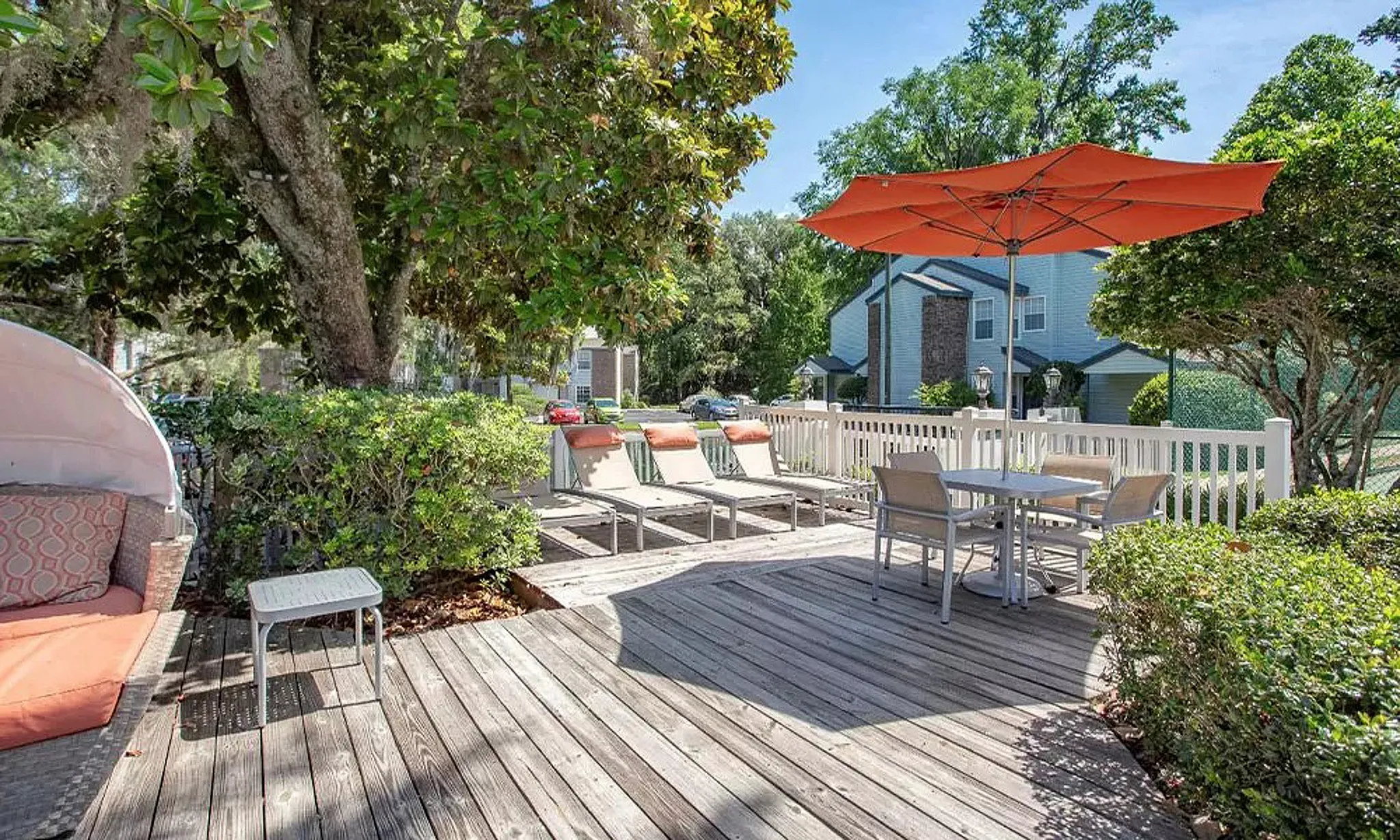 outdoor lounge station with lounge chairs & tables