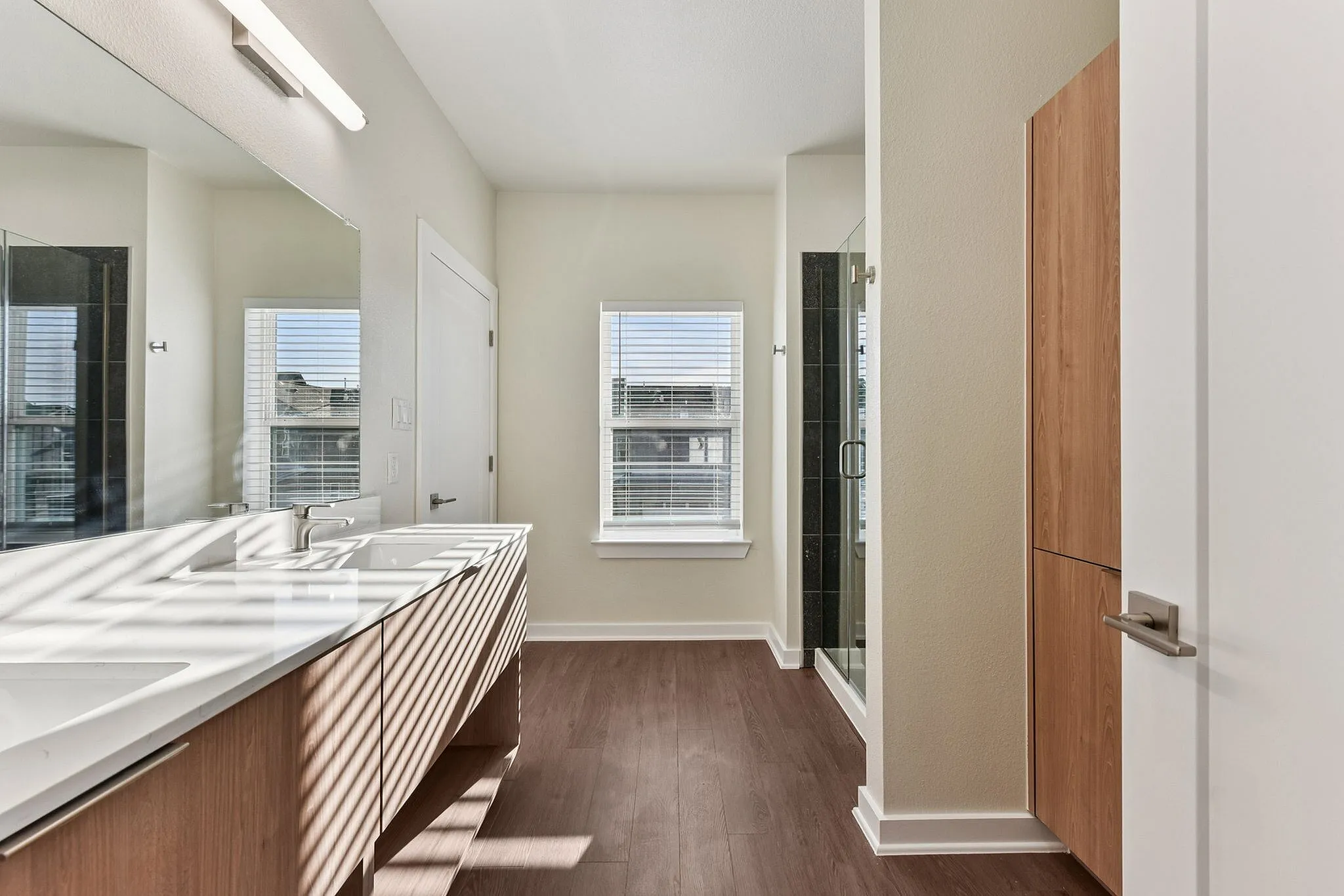 Large bathroom with walk-in shower and large double vanity