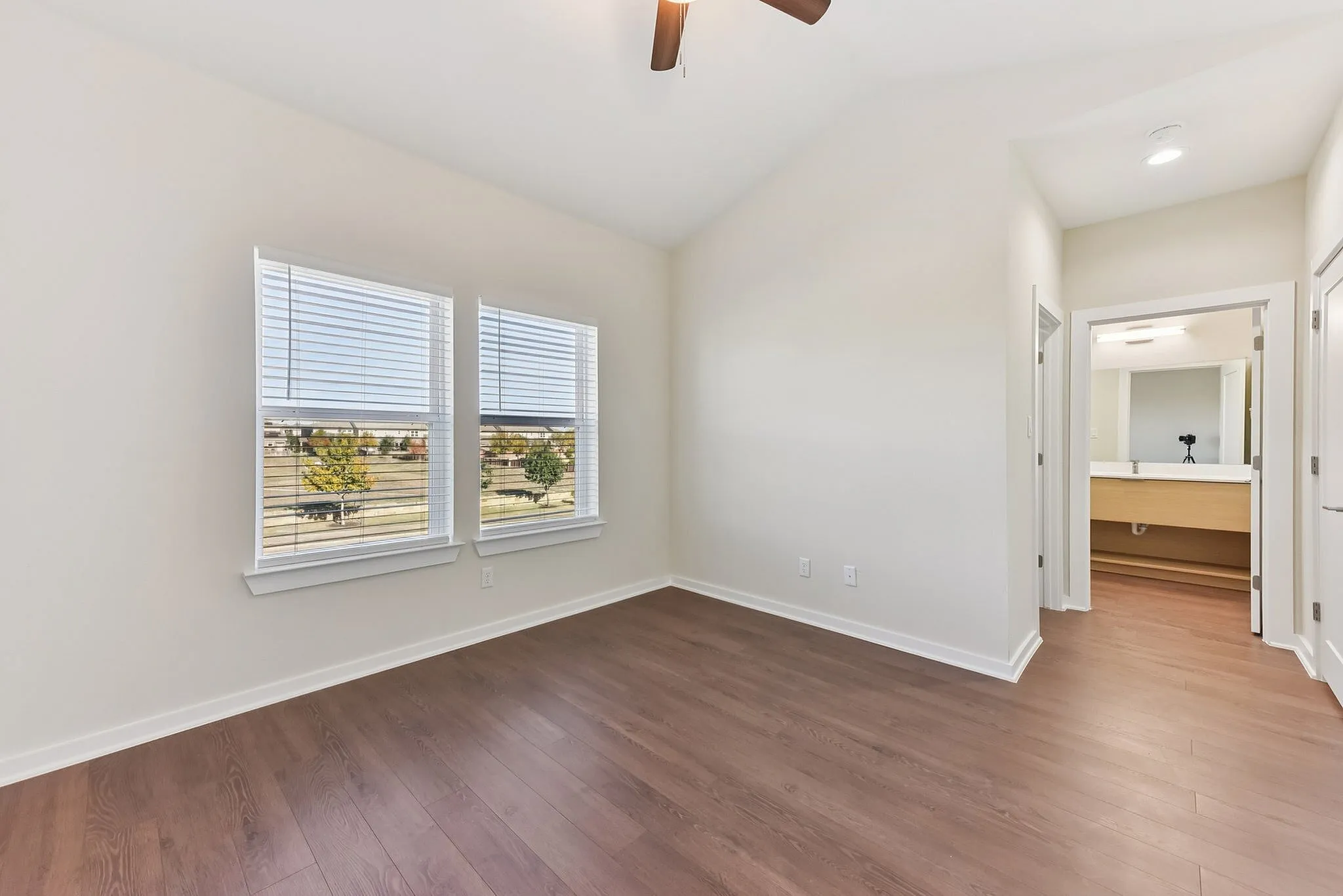 large bedroom with bathroom access