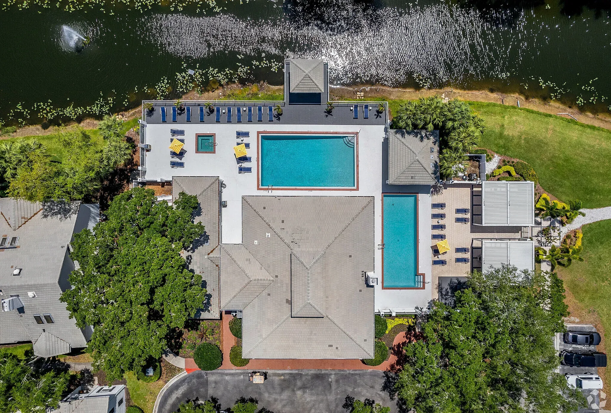 Aerial of pool with cabanas and clubhouse