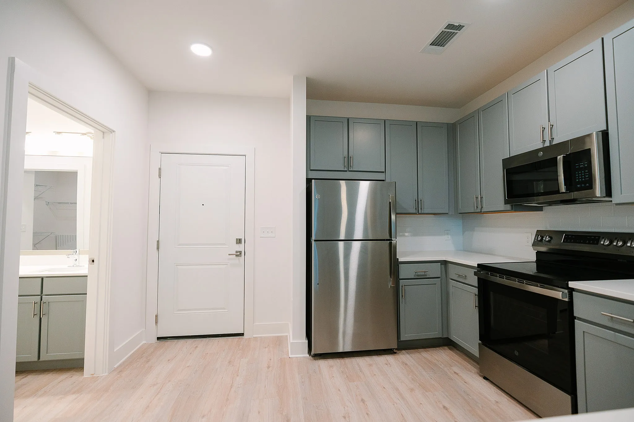 open living space with upgraded kitchen