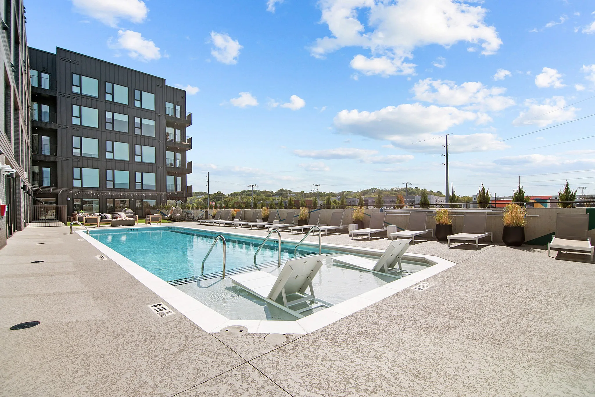 pool with lounge seating