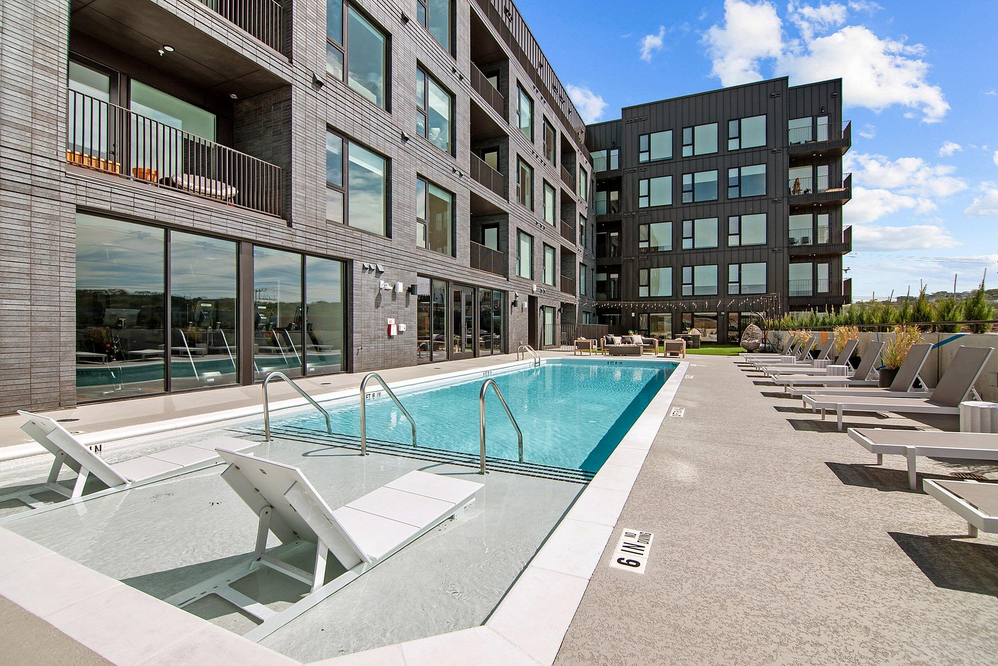 pool with lounge seating