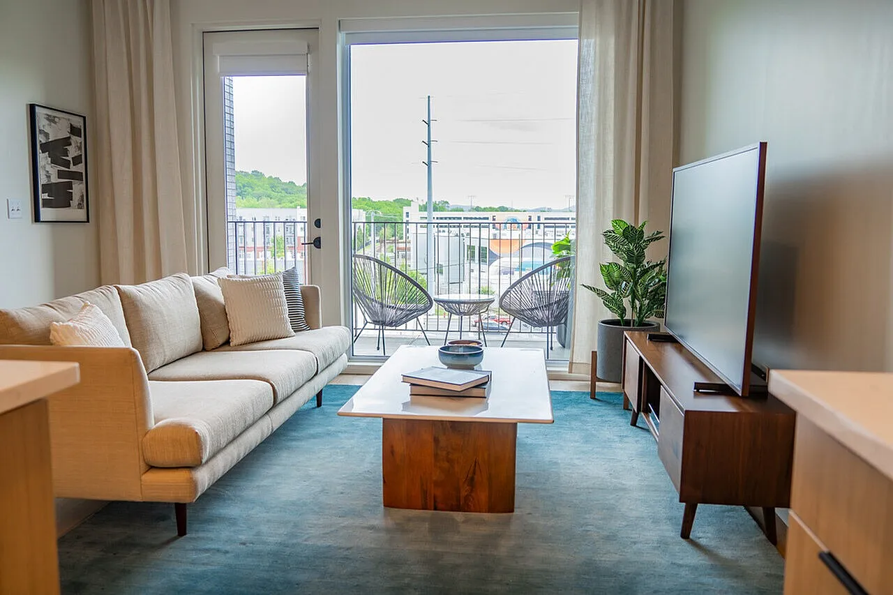 decorated living area with large windows
