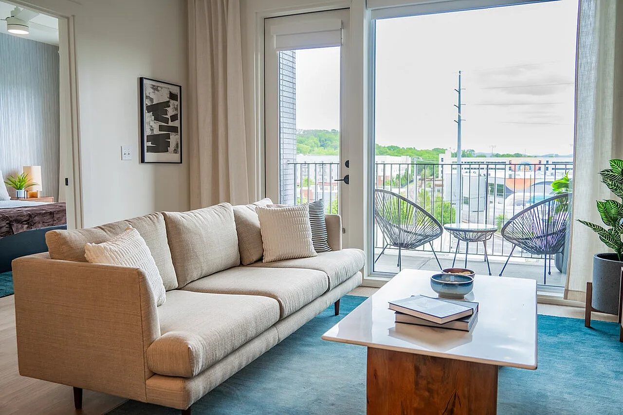 decorated living area with large windows
