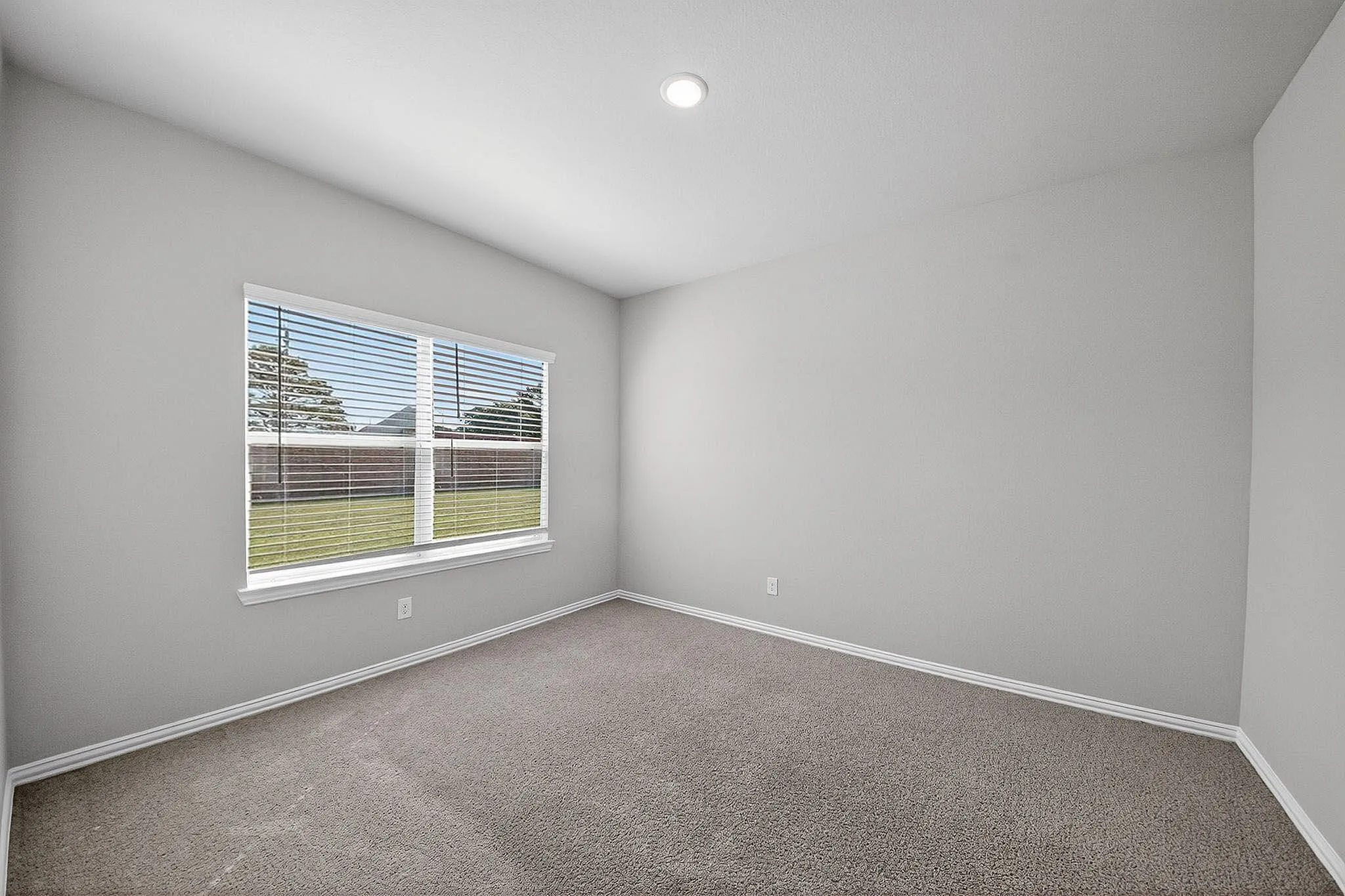 guest bedroom with carpet