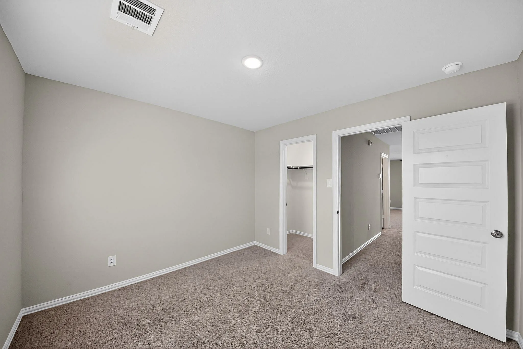 guest bedroom with carpet