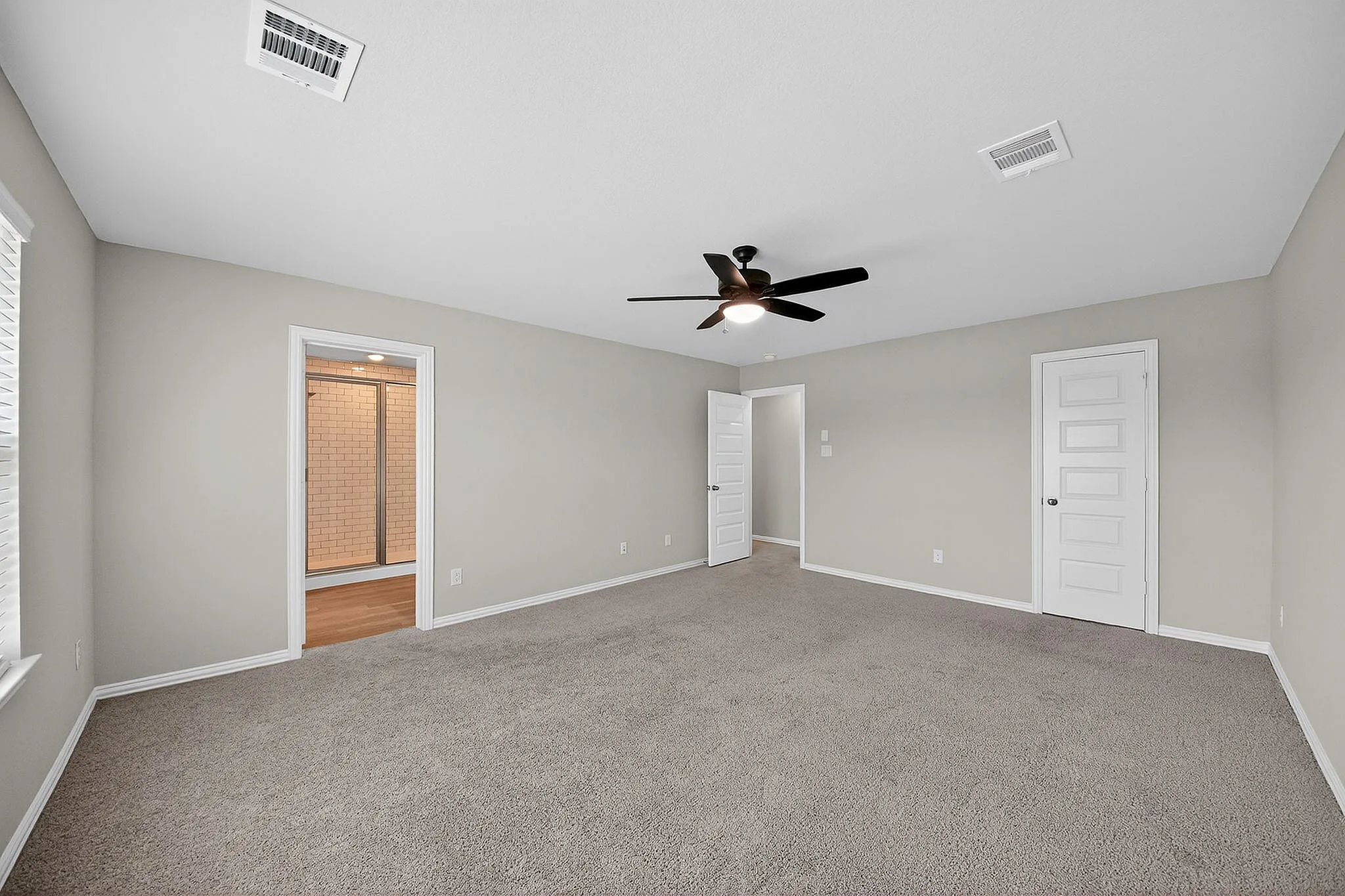 master bedroom with ceiling fan