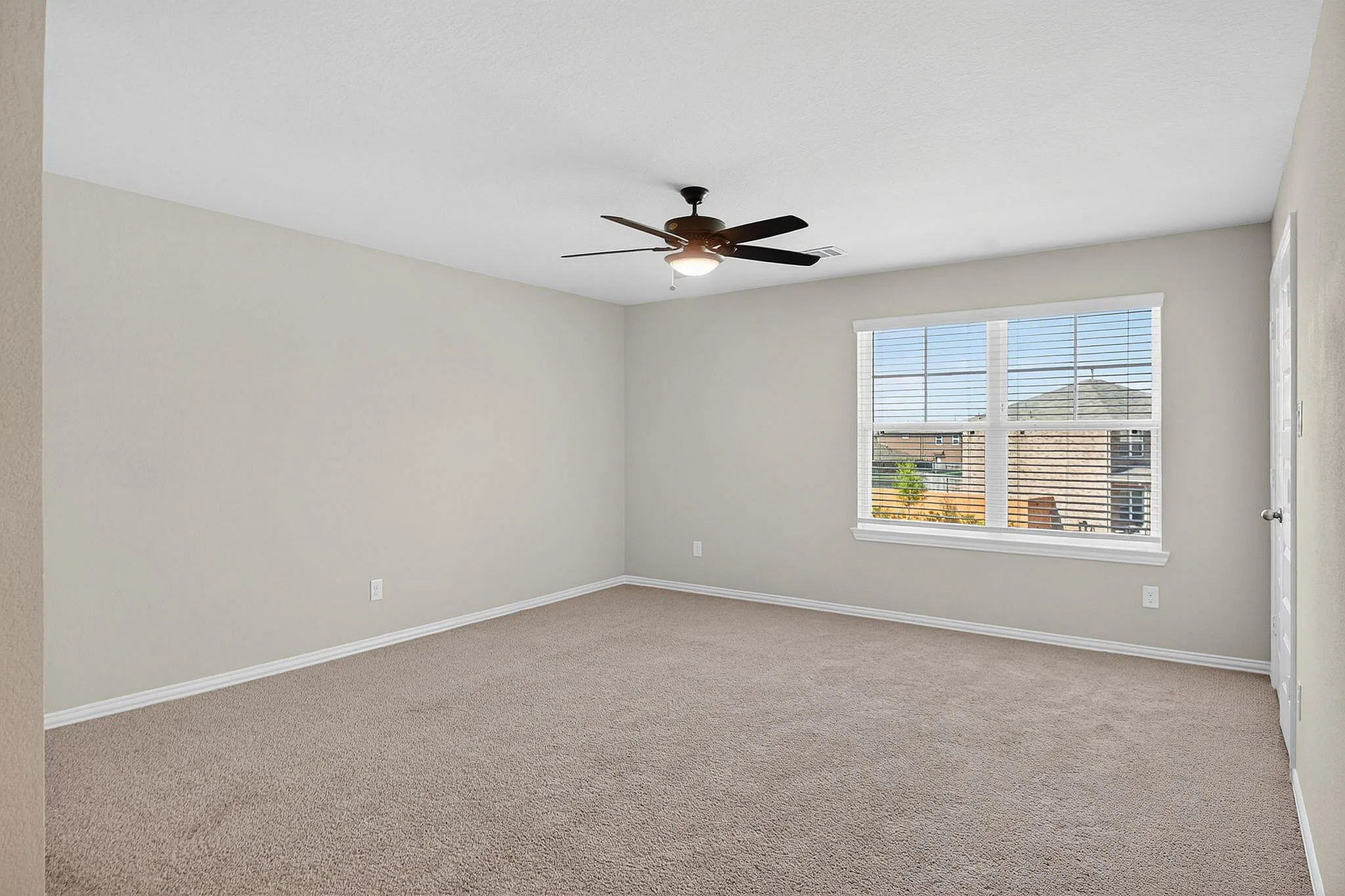master bedroom with ceiling fan