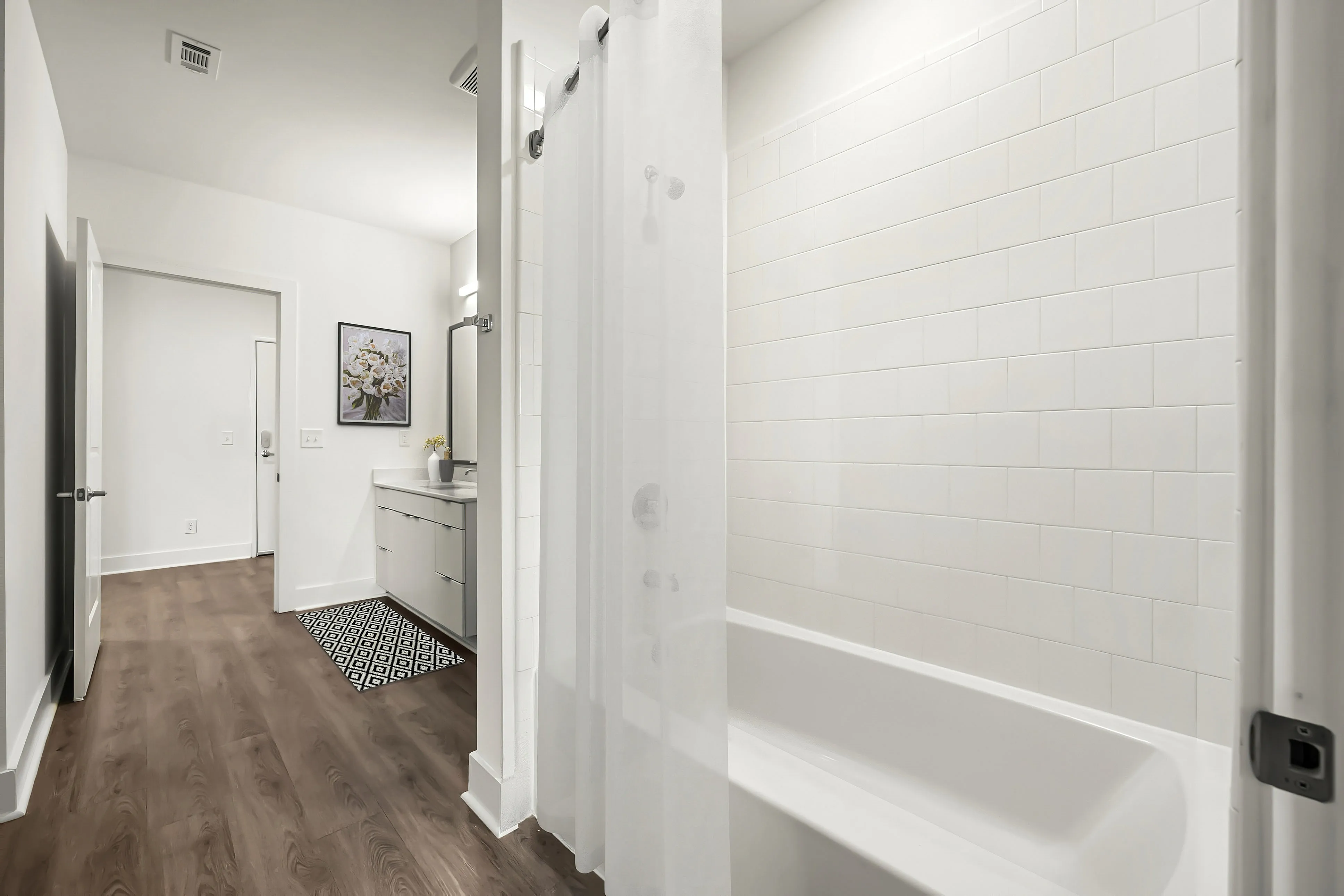 spacious bathroom with shower tub combo
