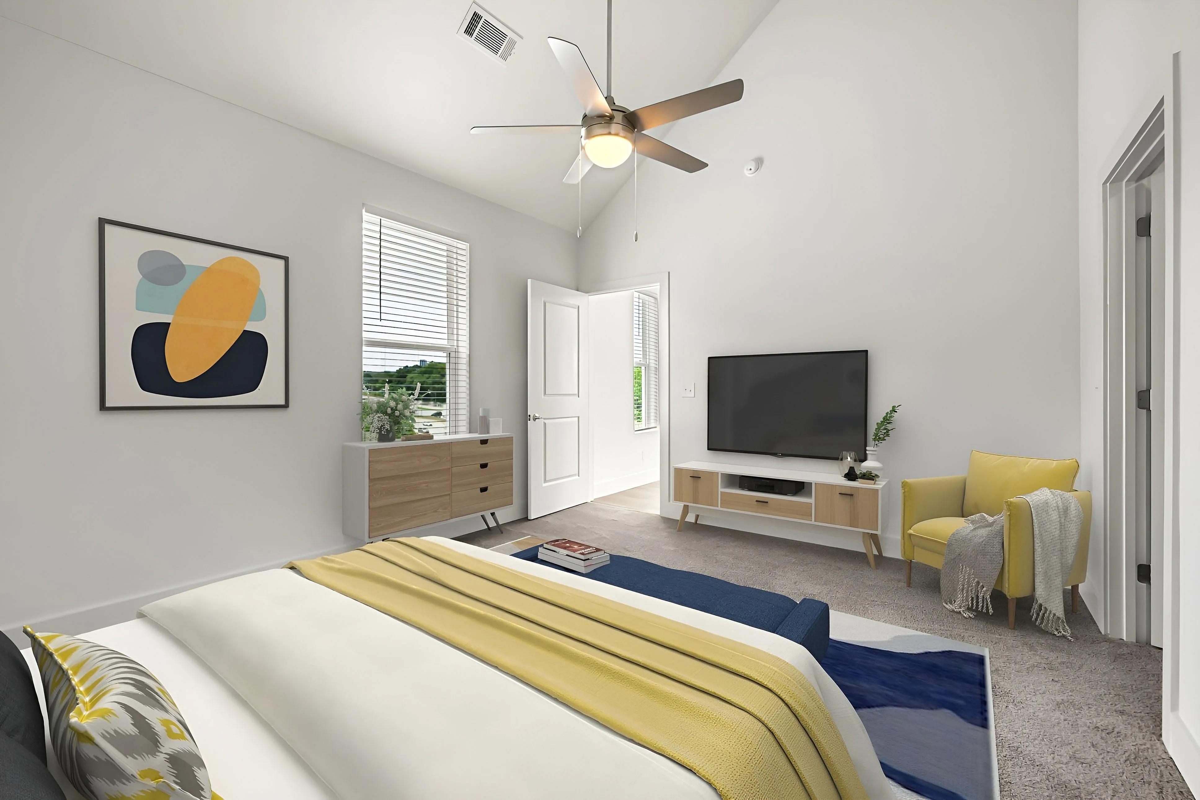 primary bedroom with vaulted ceiling