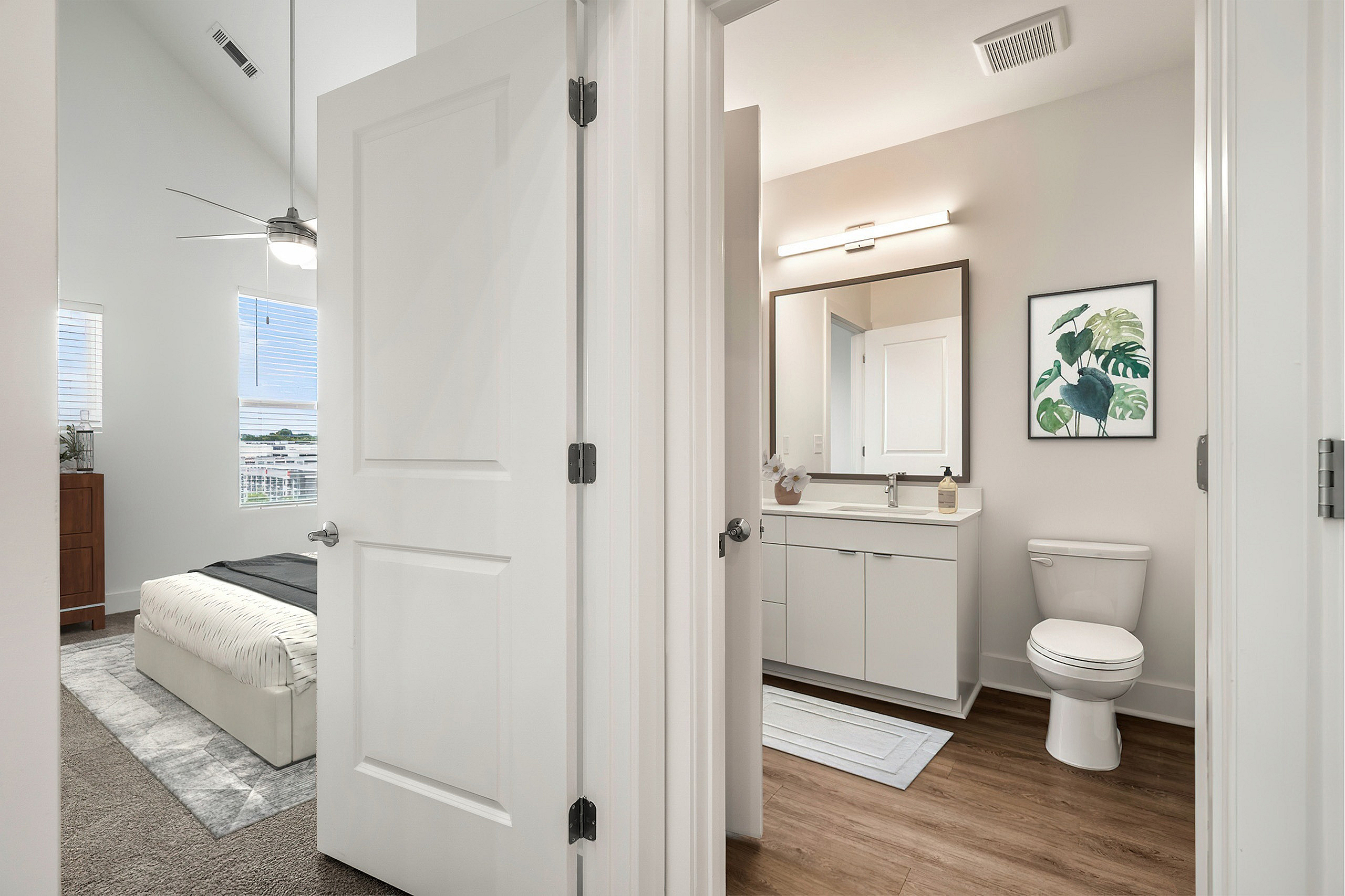 bathroom next to bedroom