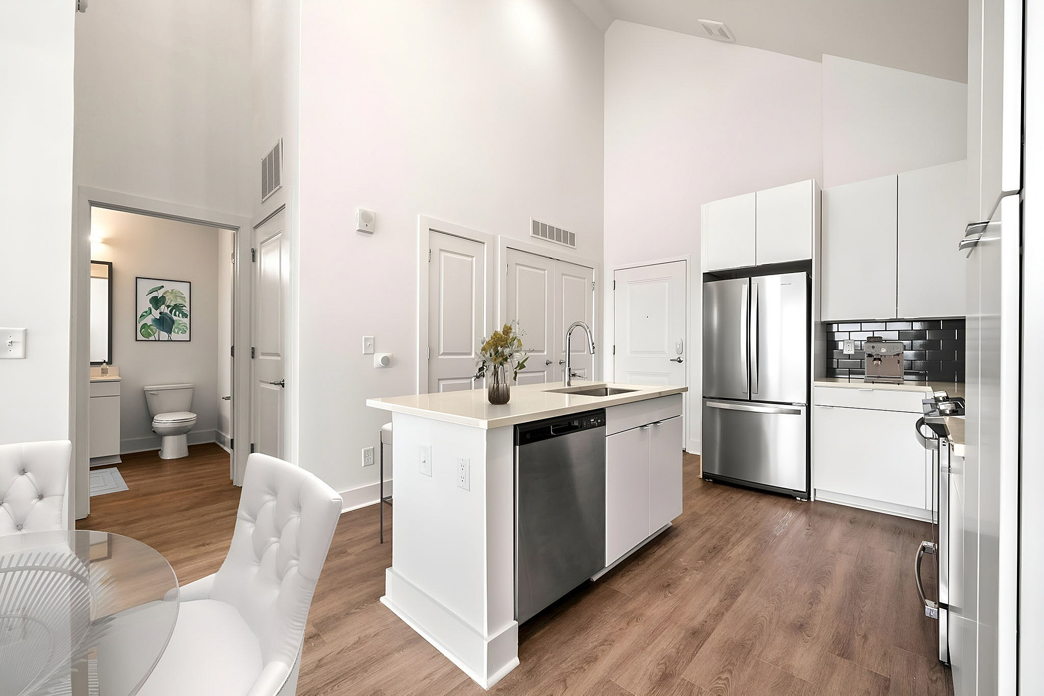 kitchen with stainless steel appliances and wood style flooring
