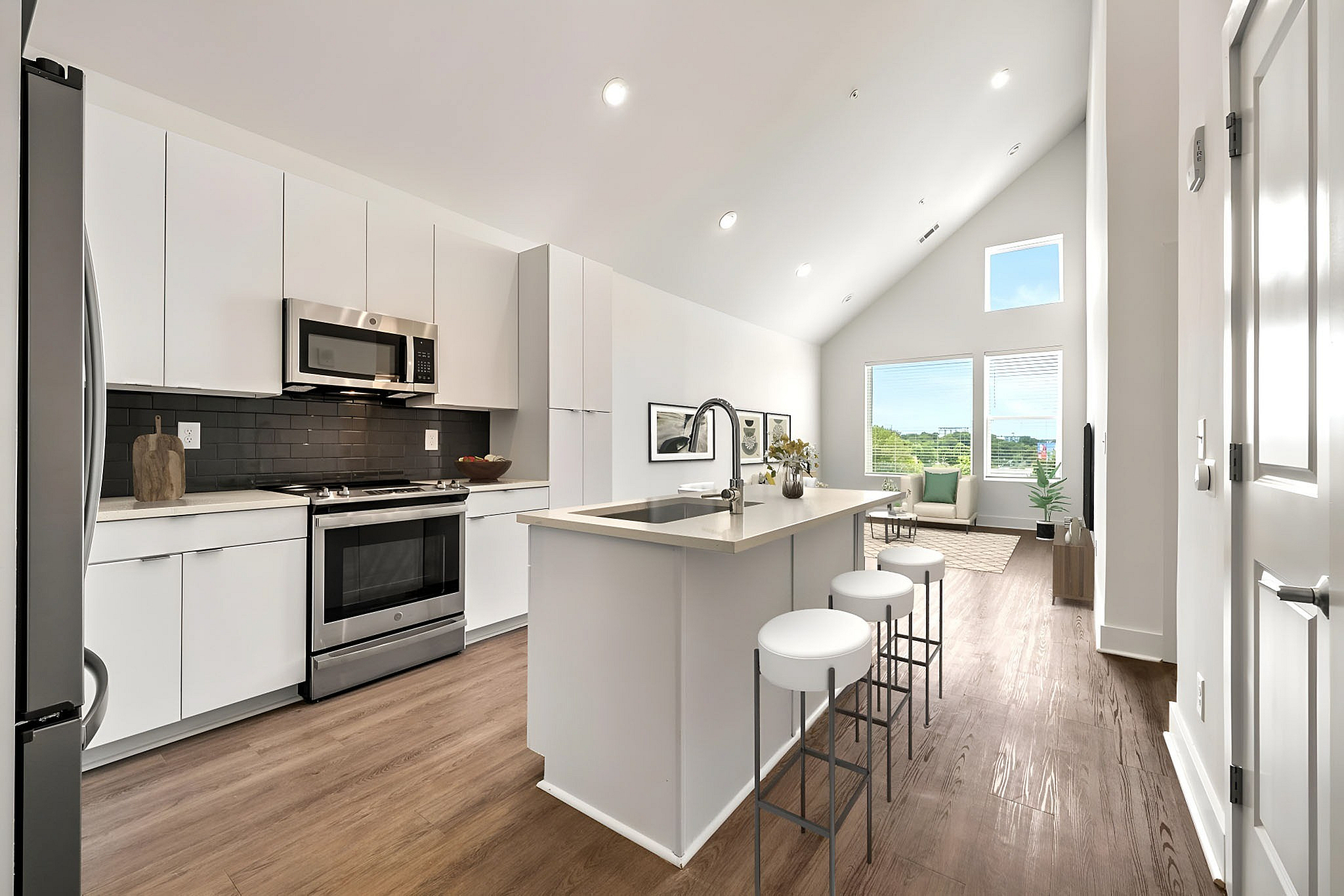 kitchen with stainless steel appliances and wood style flooring