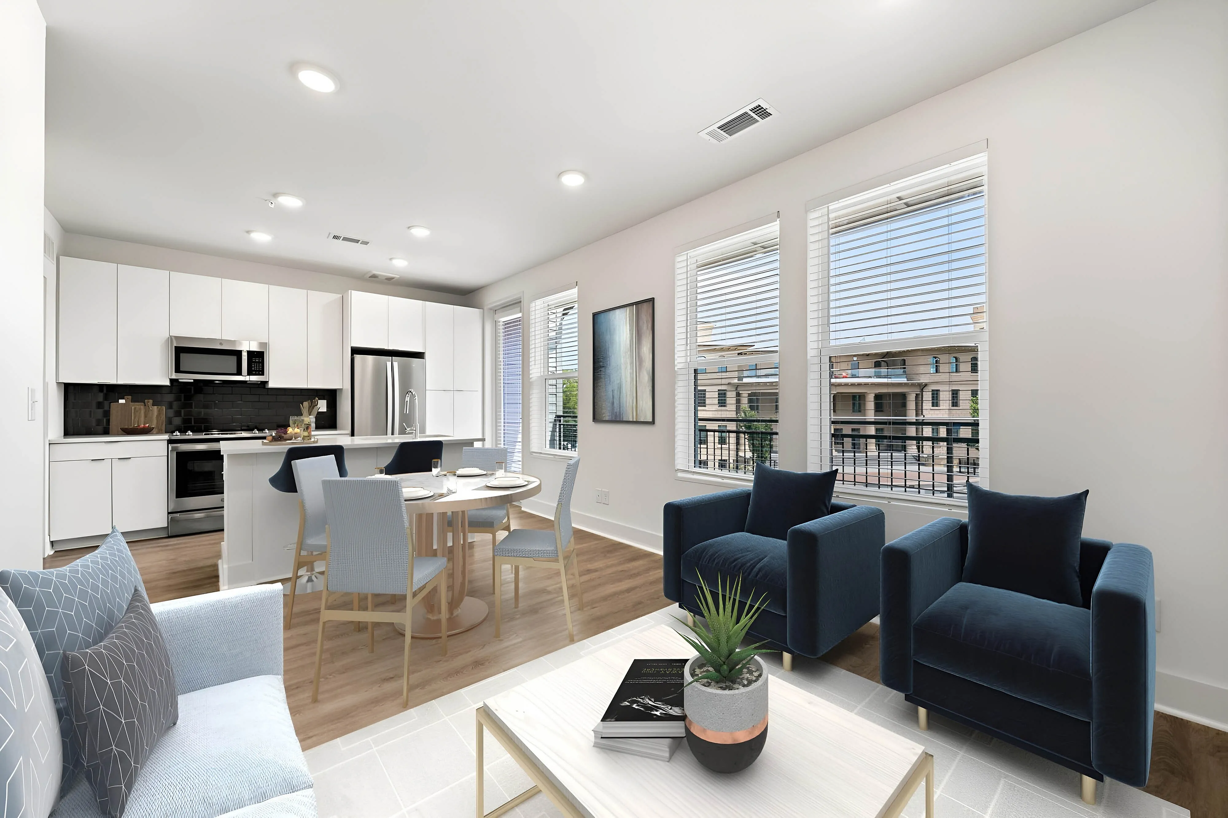 open concept living and dining area next to kitchen