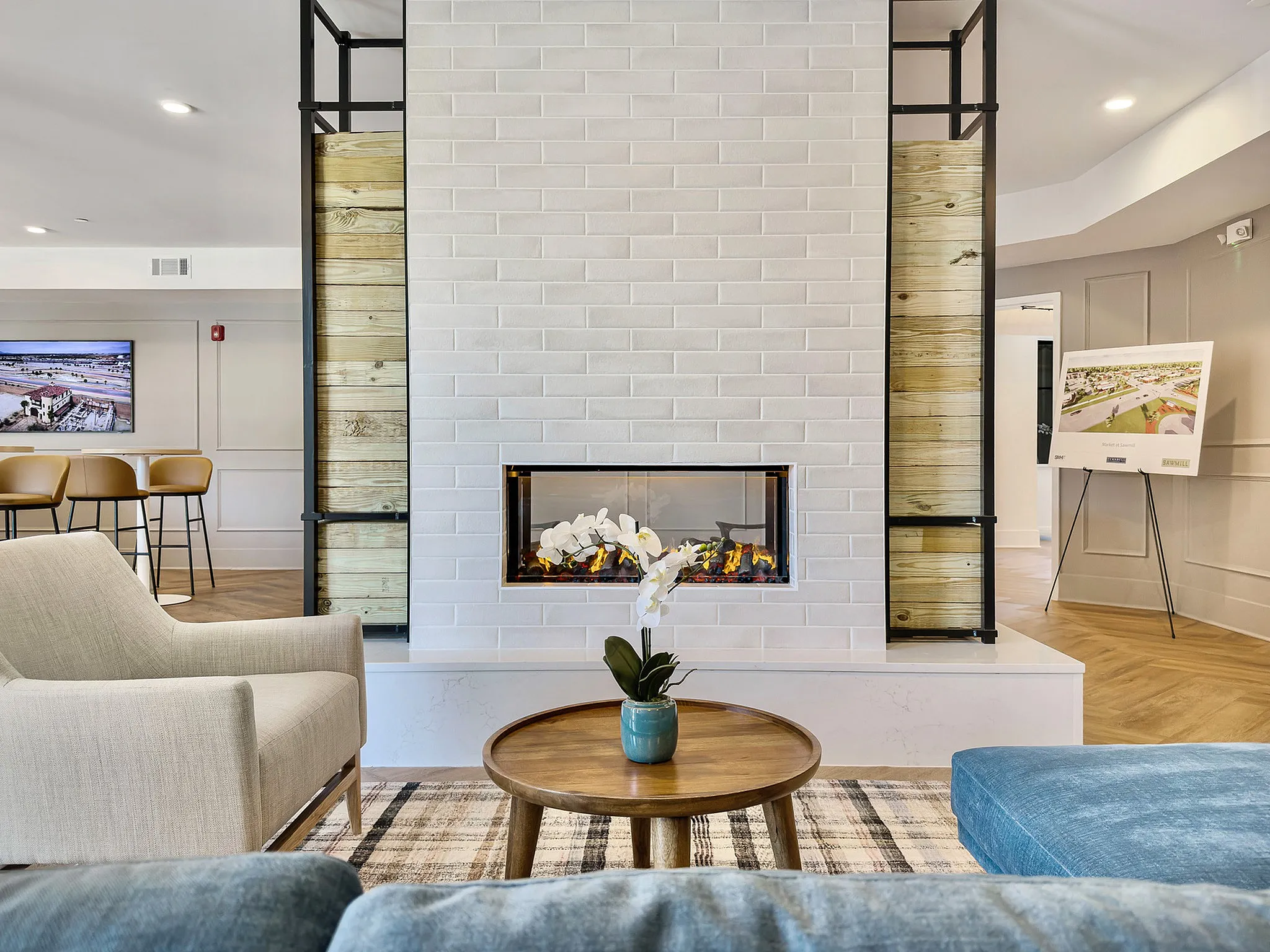 clubhouse with fireplace and seating