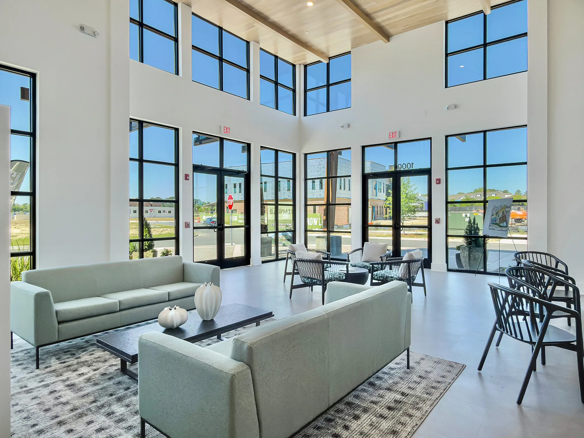 clubroom with extra windows and natural lighting