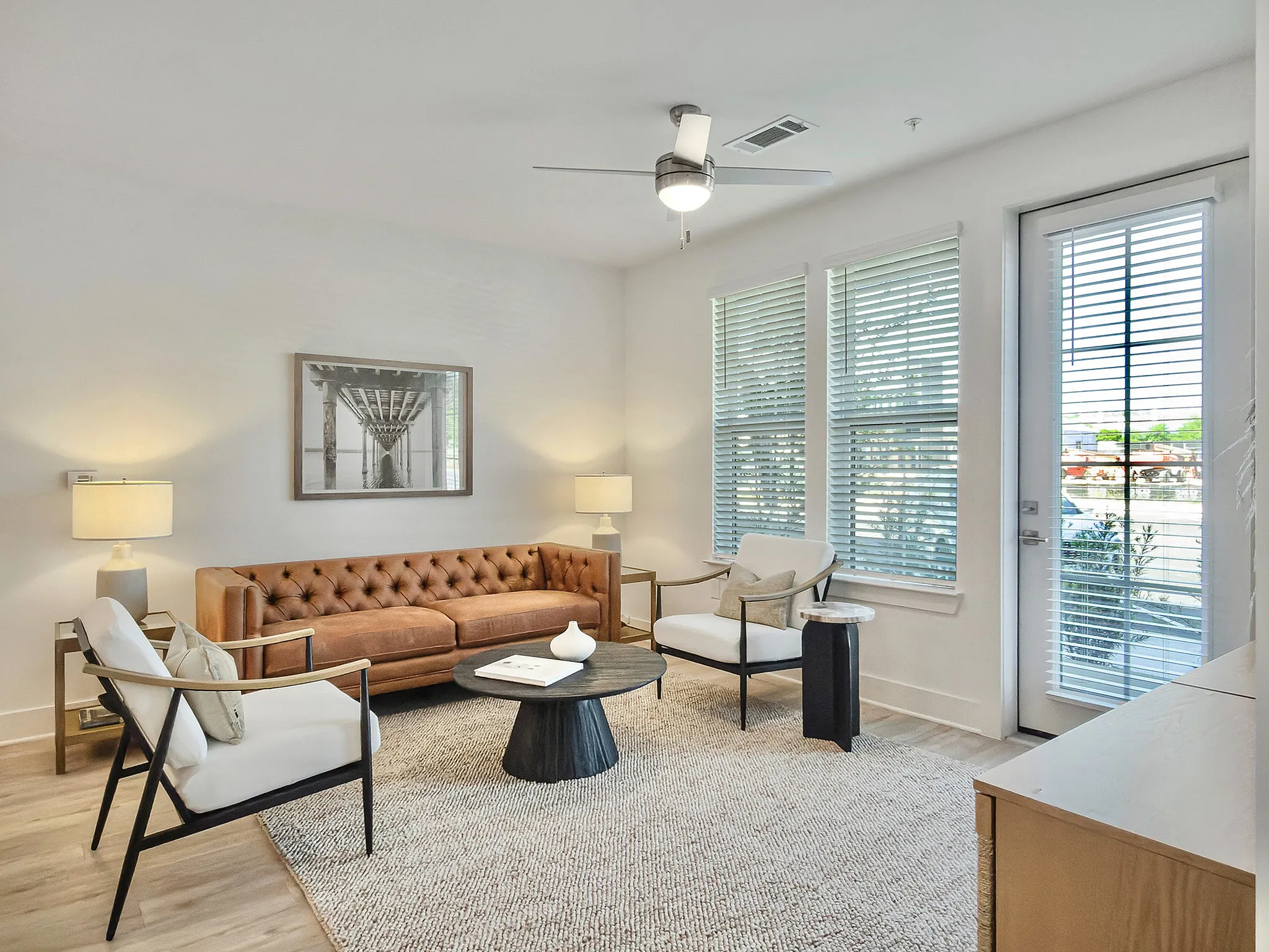 living room with couch and walkout patio