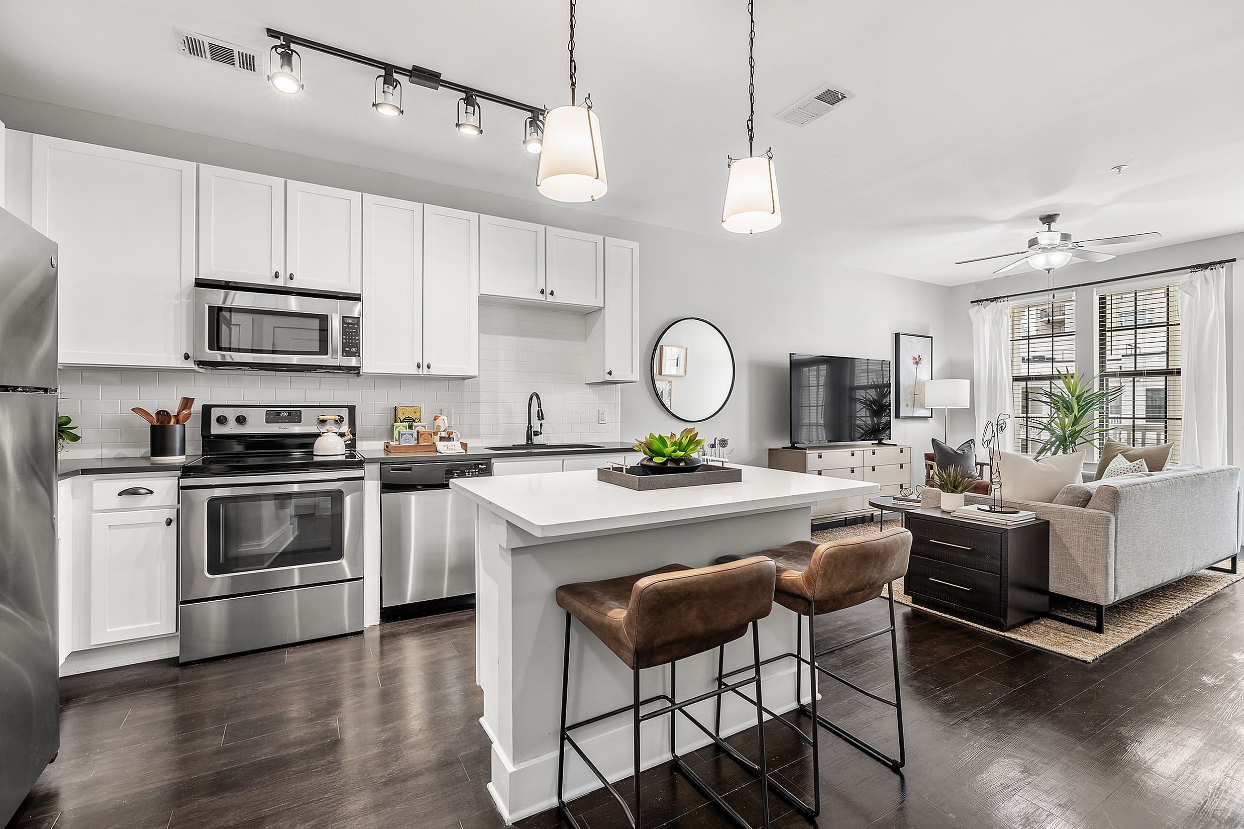 Kitchens at The Jane with white cabinets and large island
