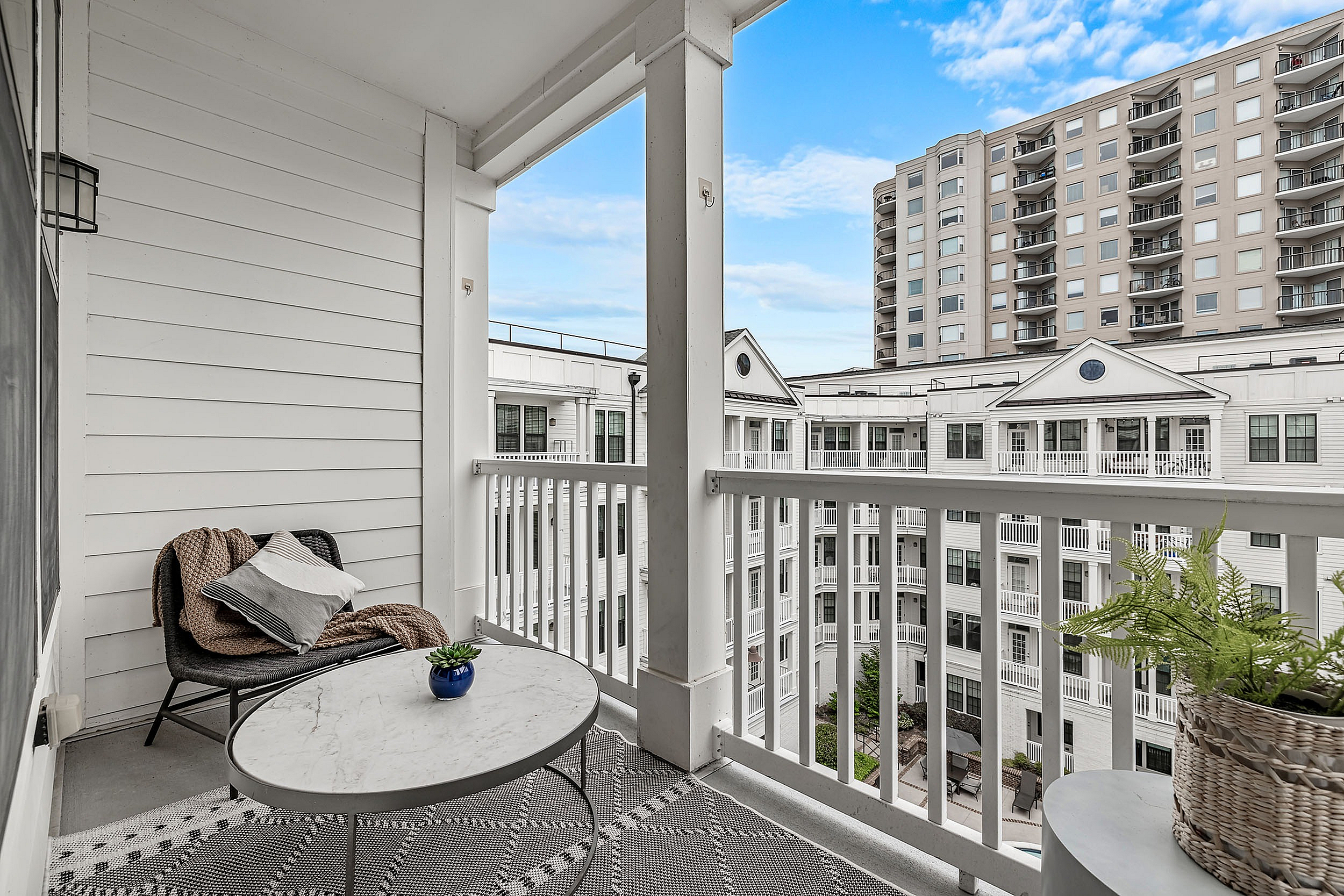 Balcony overlooking the city and the pool