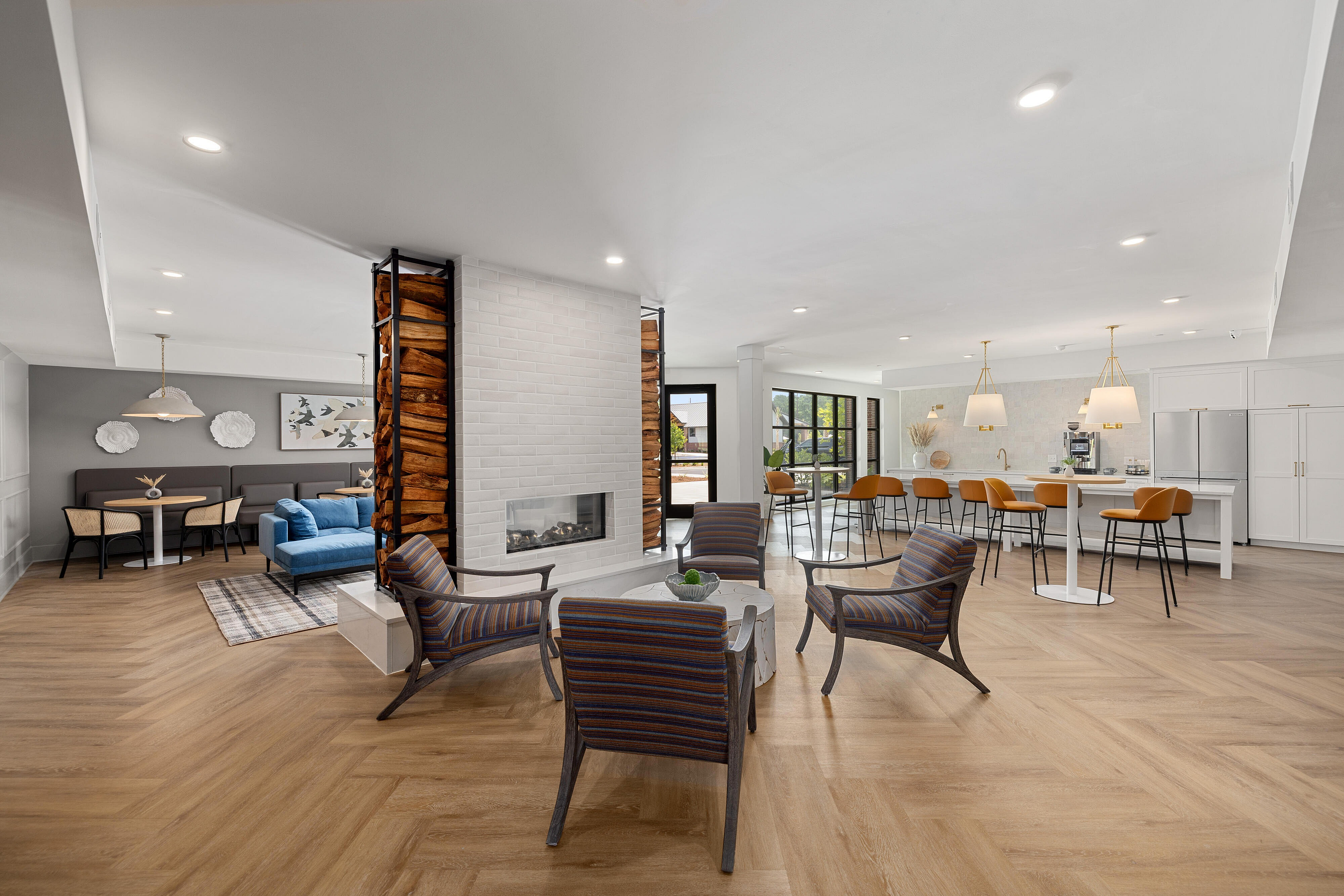interior of community with seating and fireplace