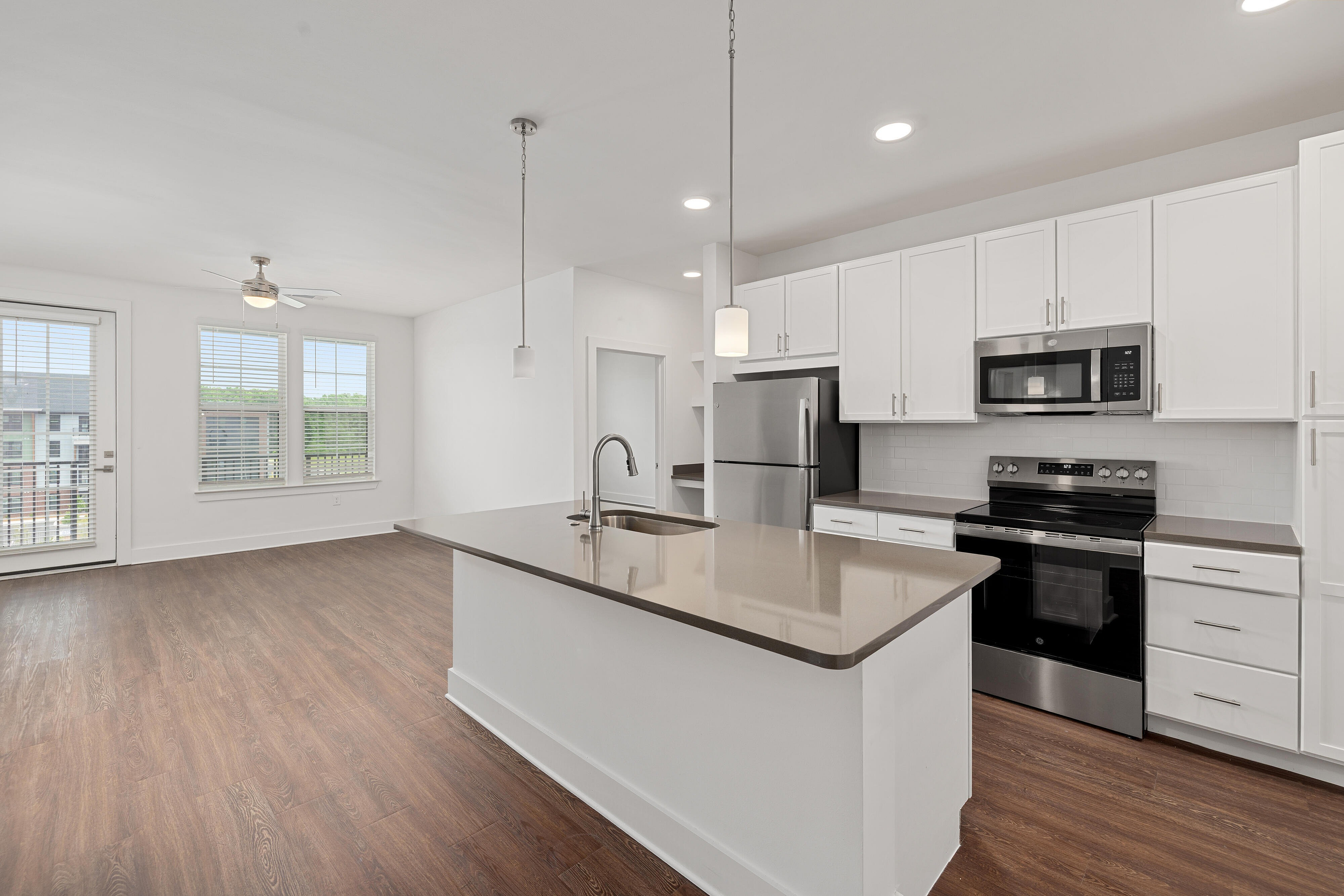 vacant kitchen with gray cabinets