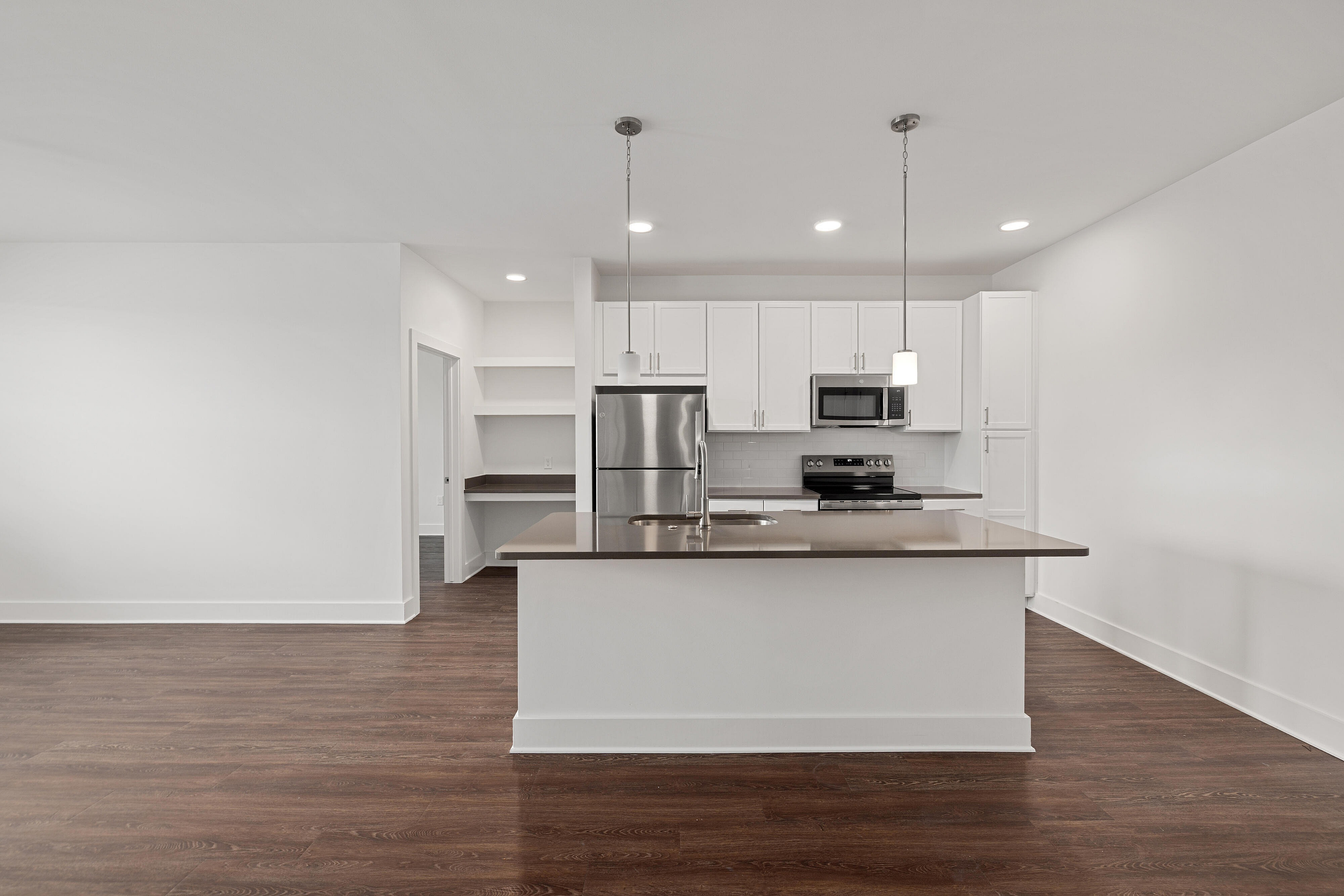 vacant kitchen with gray cabinets
