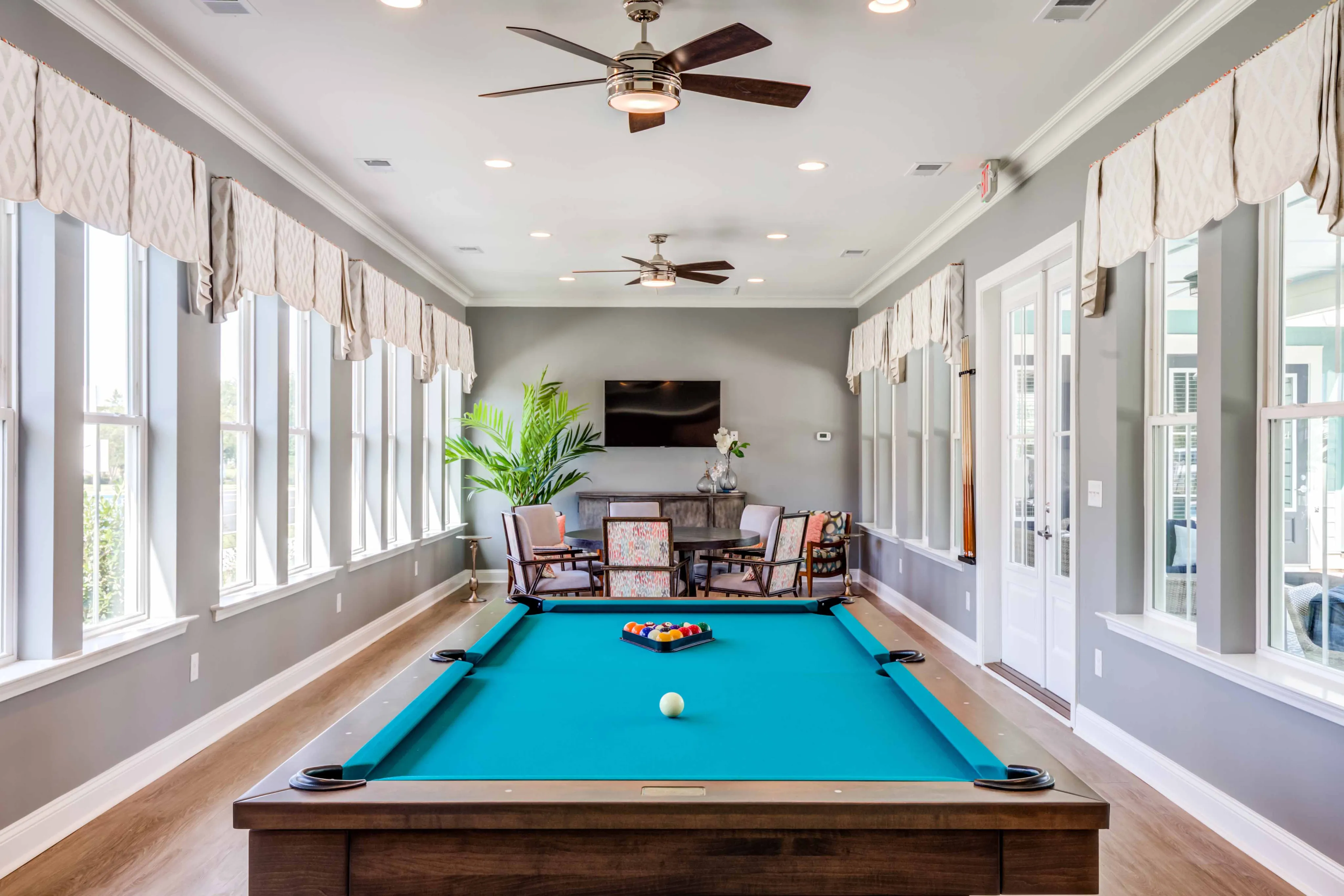 resident gaming lounge with pool table and tv