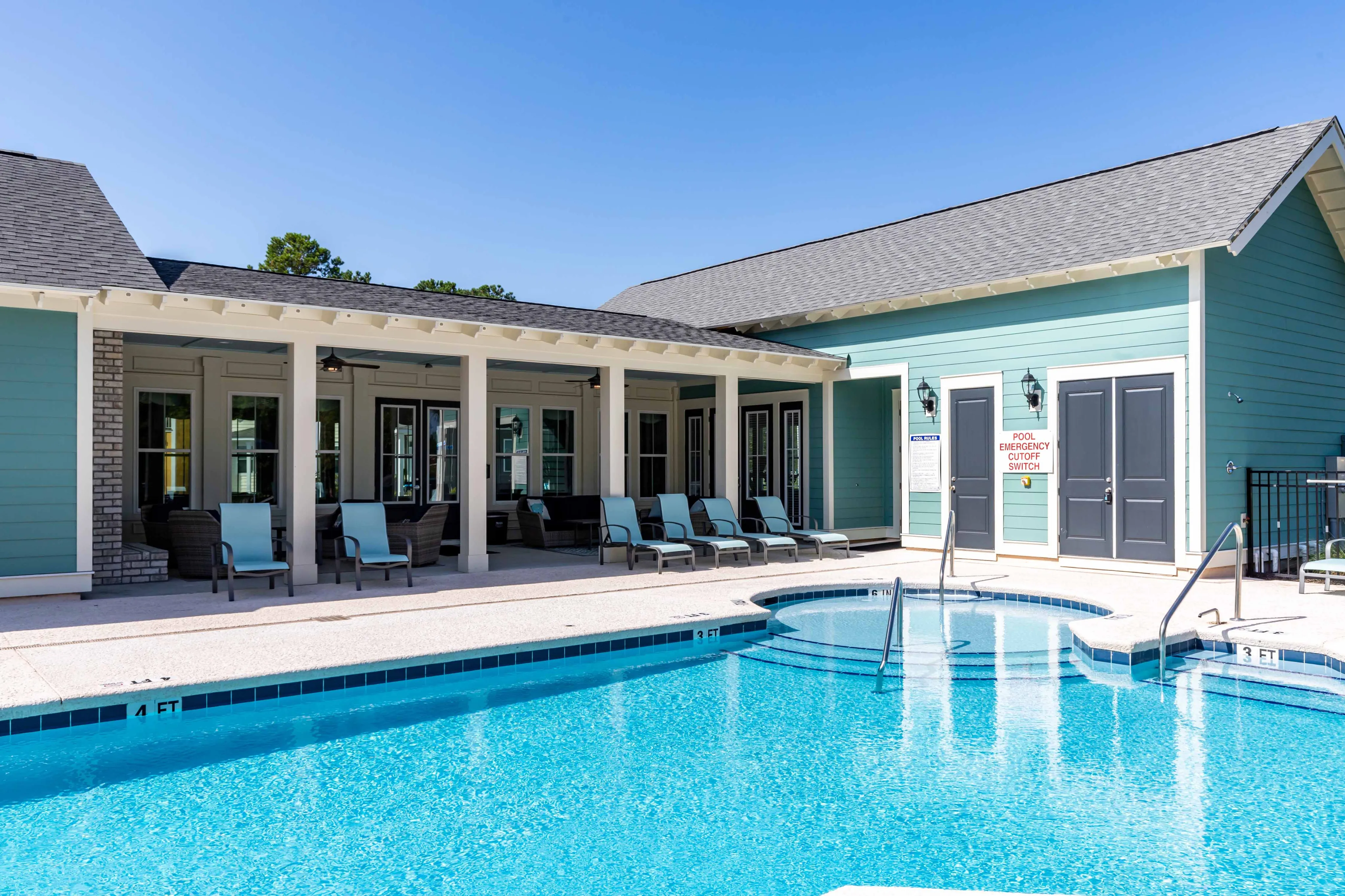 resort-syle swimming pool with cabanas