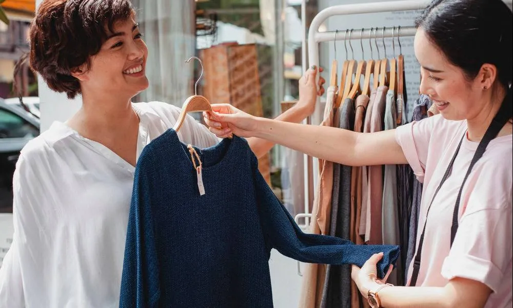 two women shopping for clothing