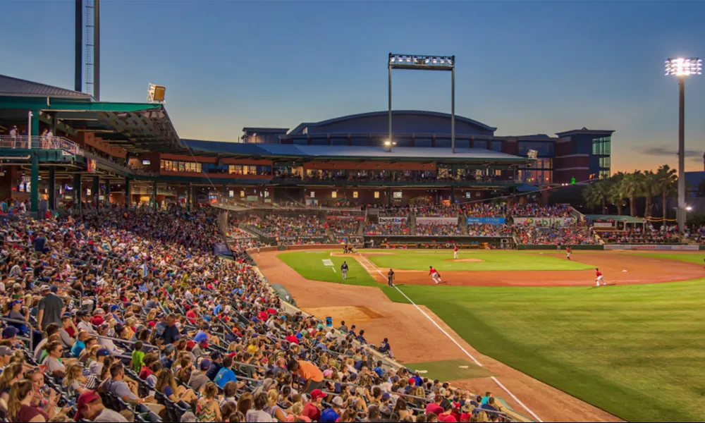 crowded baseball game at nighttime