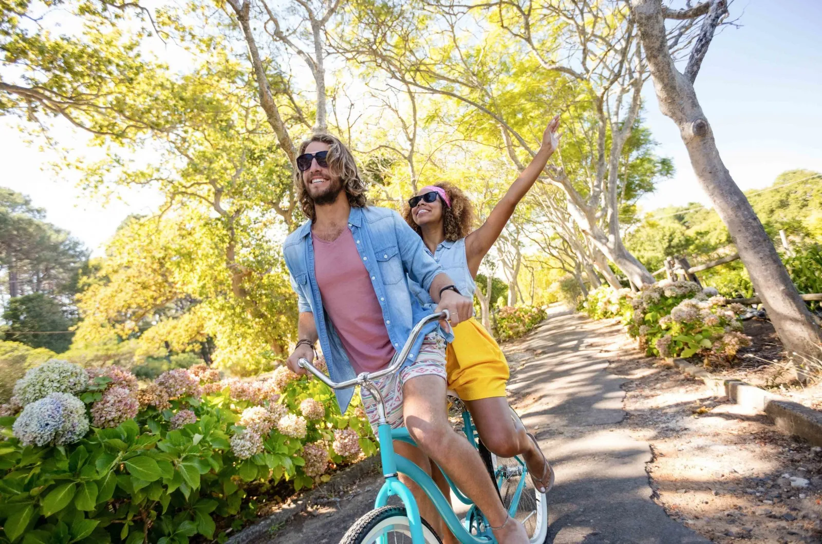 girl and man on bike outside