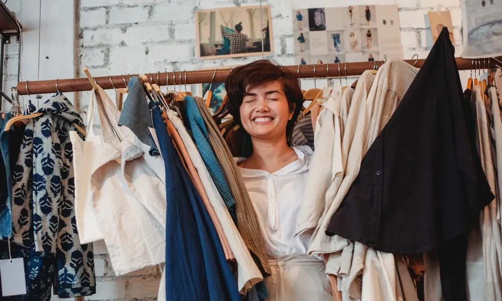 girl excited about shopping clothes