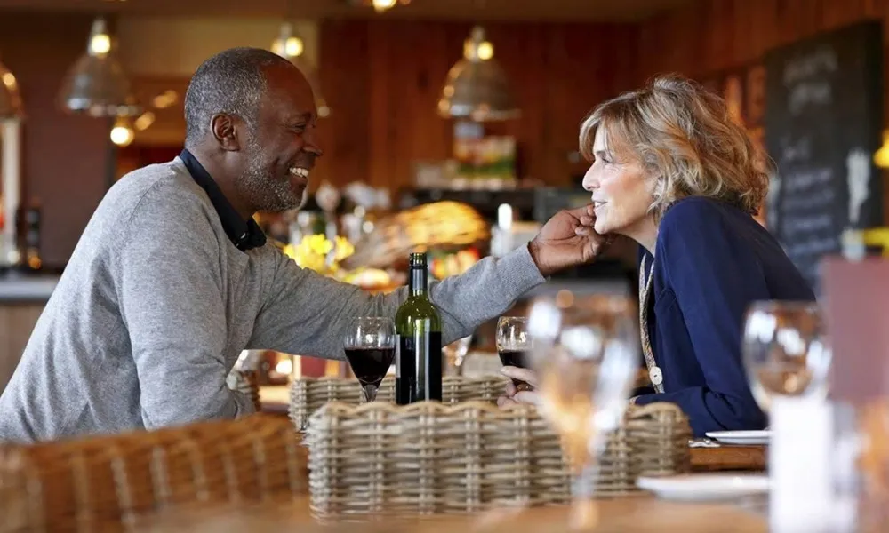 mature couple dining together