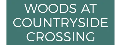 Woods at Countryside Crossing Logo