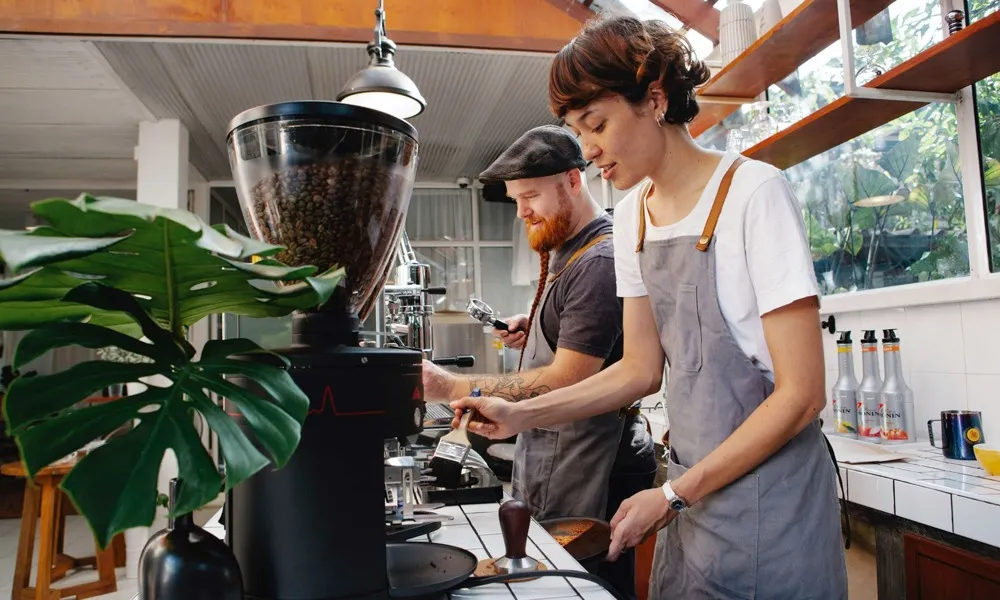 hipster people making coffee