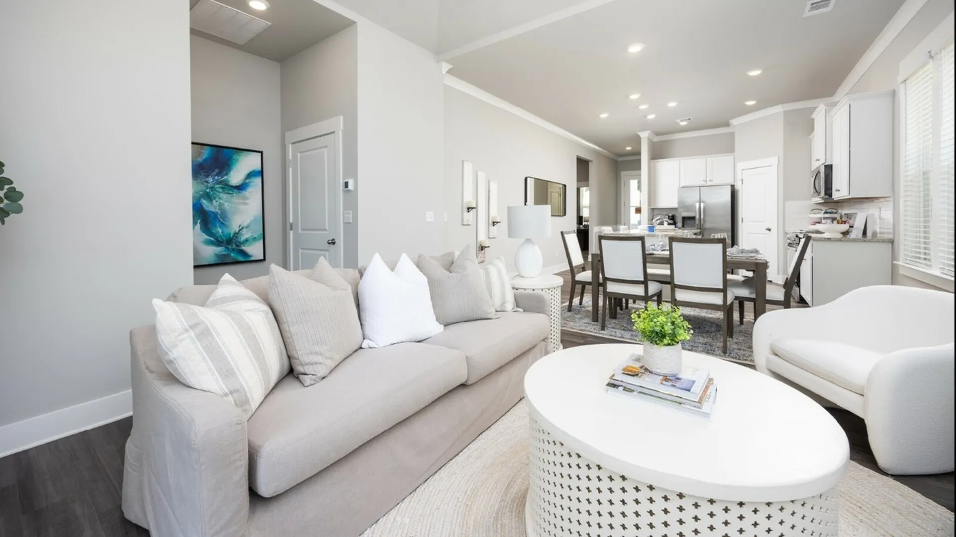 Furnished living room, dining room and kitchen