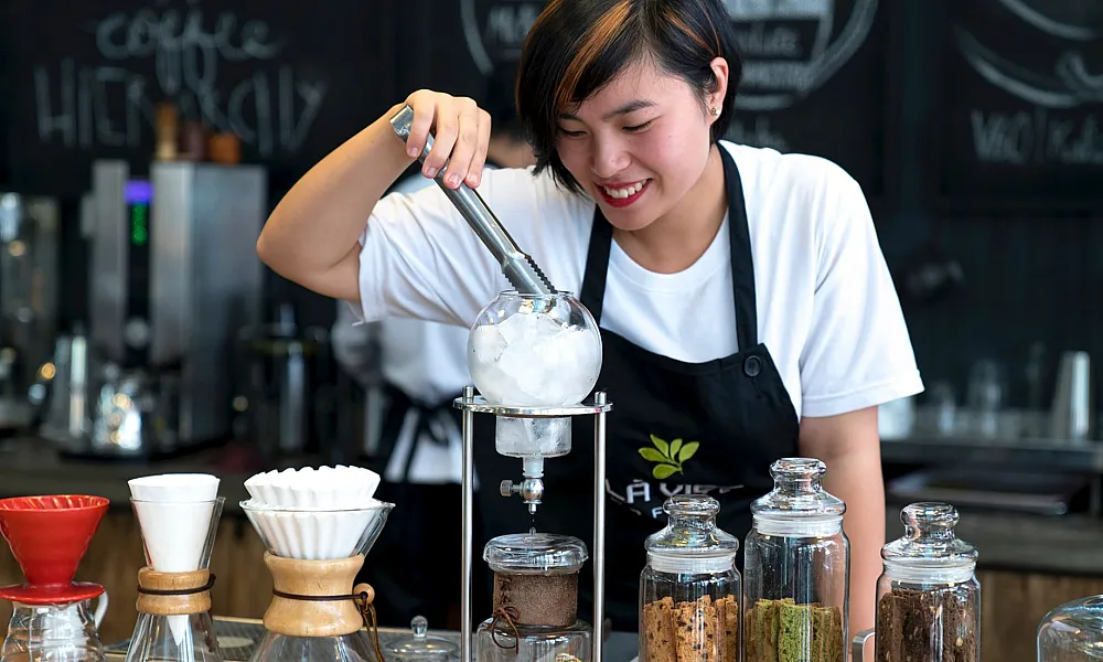 Woman Preparing coffee